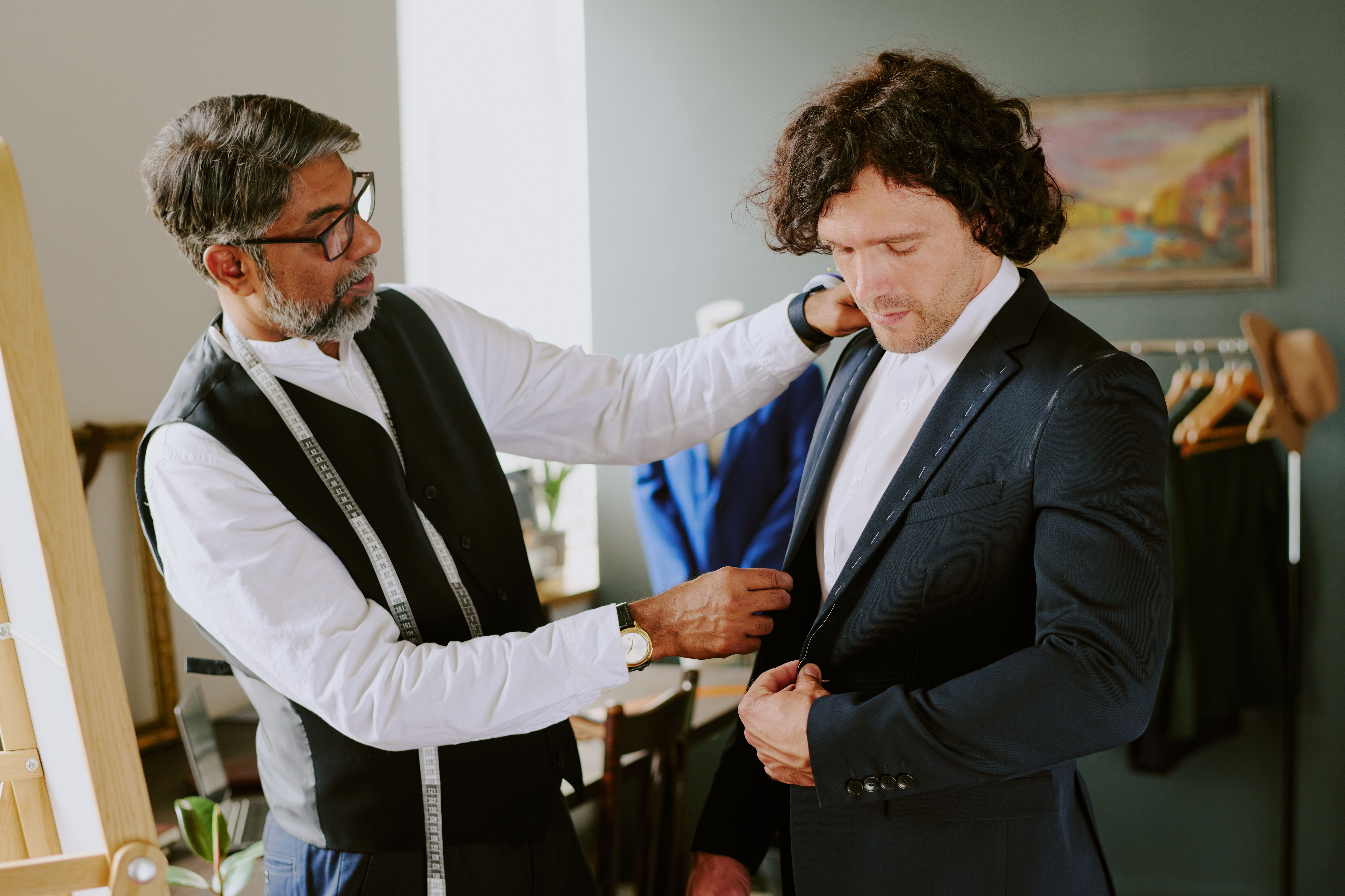 tailor adjusting suit