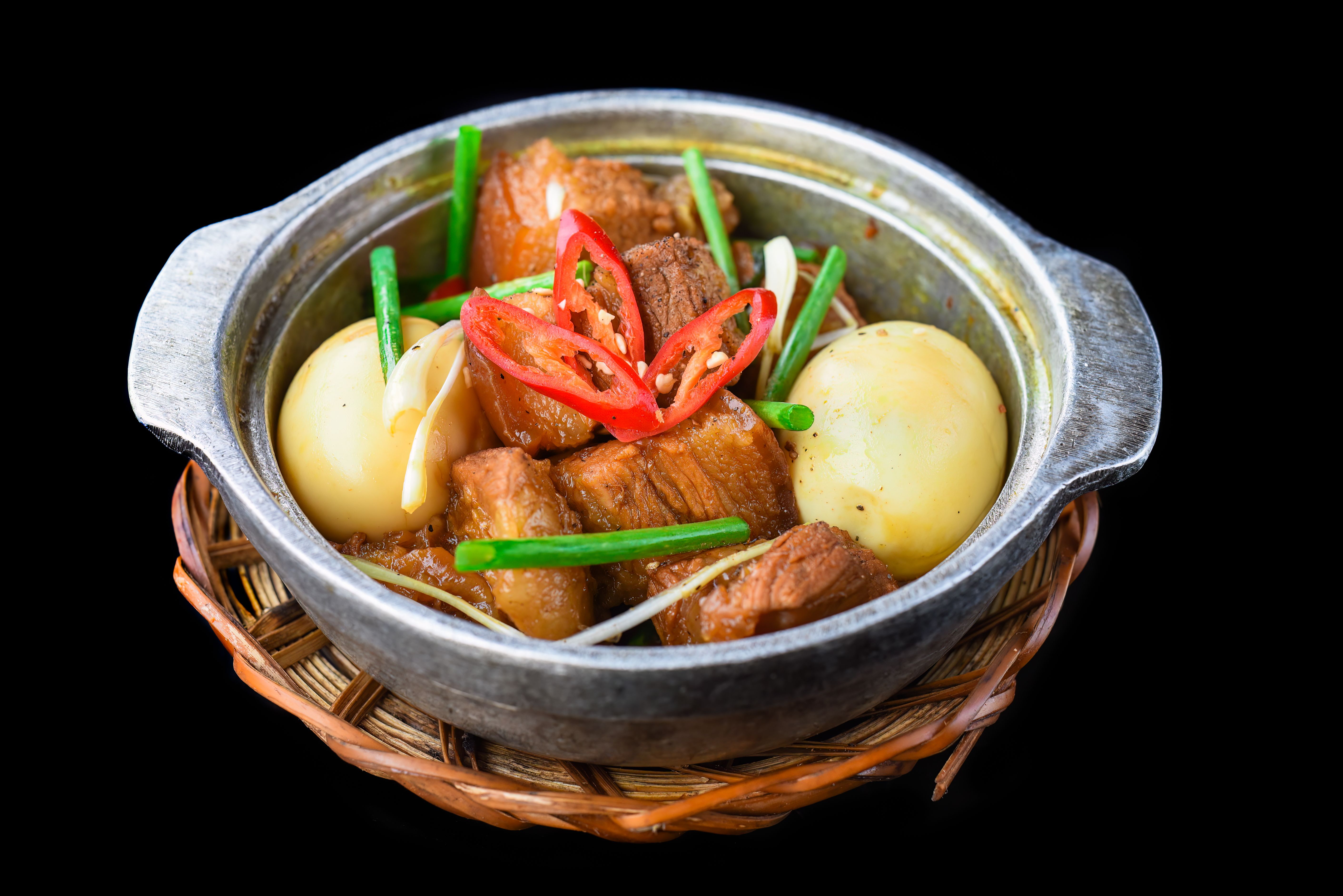 Vietnamese braised pork with boiled eggs in soy sauce for a menu