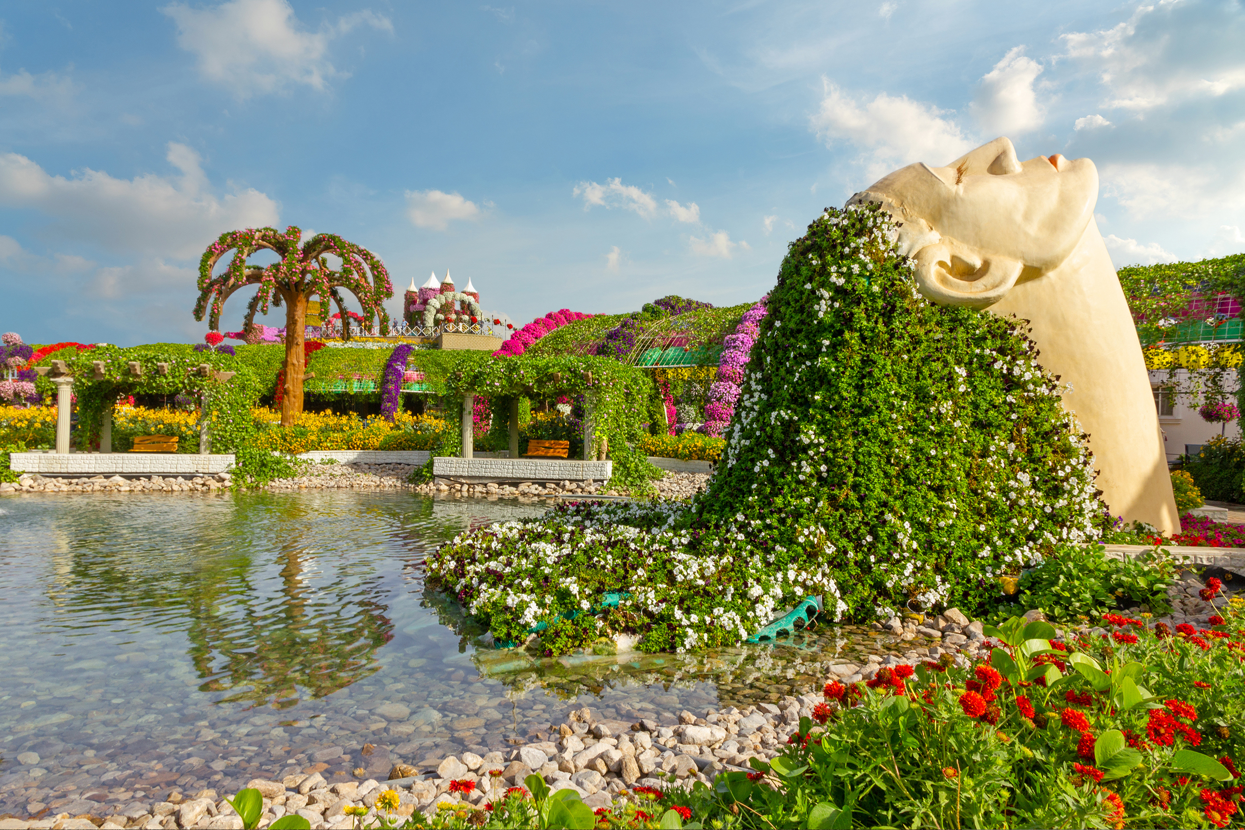 United Arab Emirates: Female head decorated with flowers in Miracle garden of Dubai.