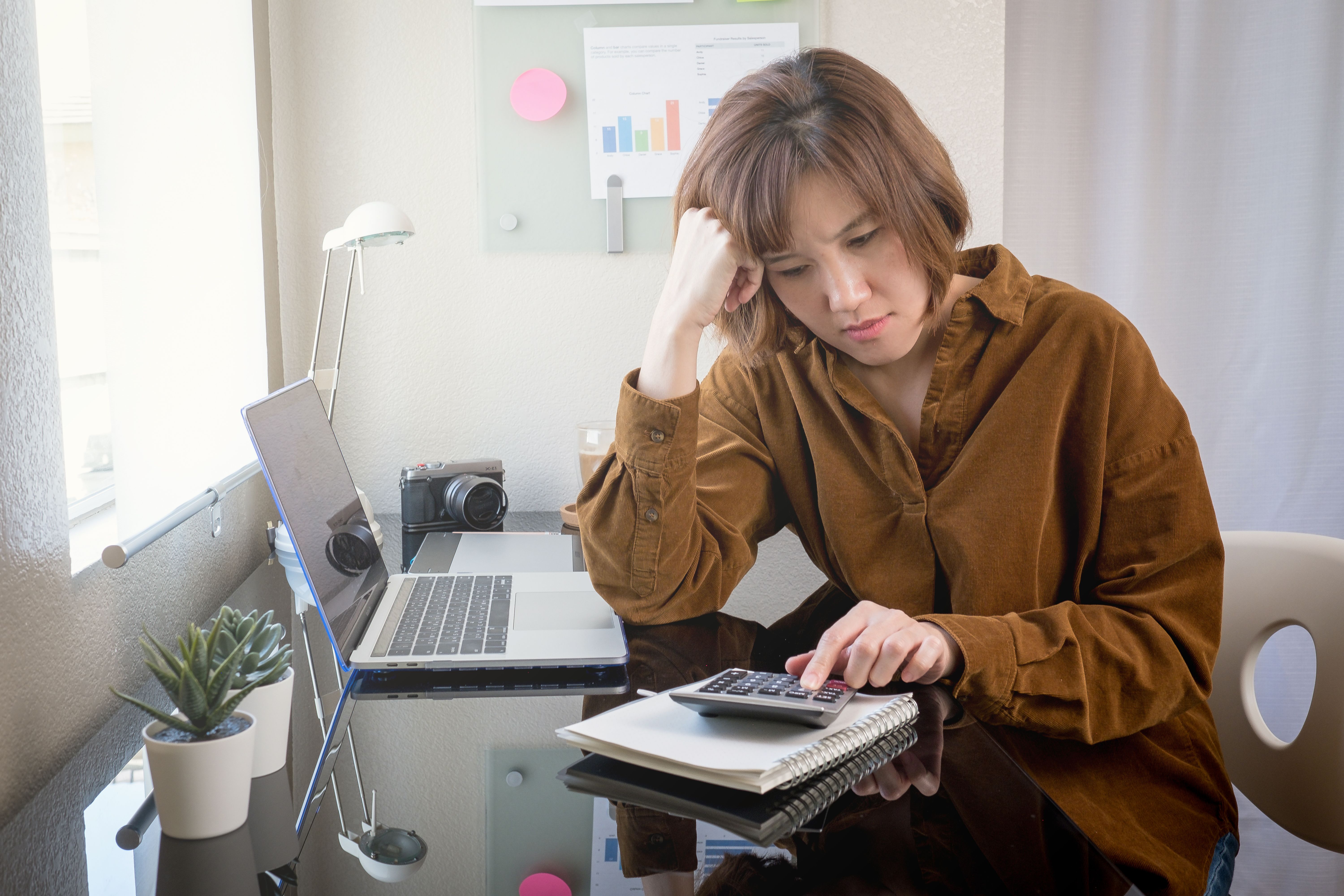 woman get stress from covid19 ,coronavirus pandemic . expense and payment problem . stay home order concept. woman get stress from covid19 ,coronavirus pandemic . expense and payment problem . stay home order concept.