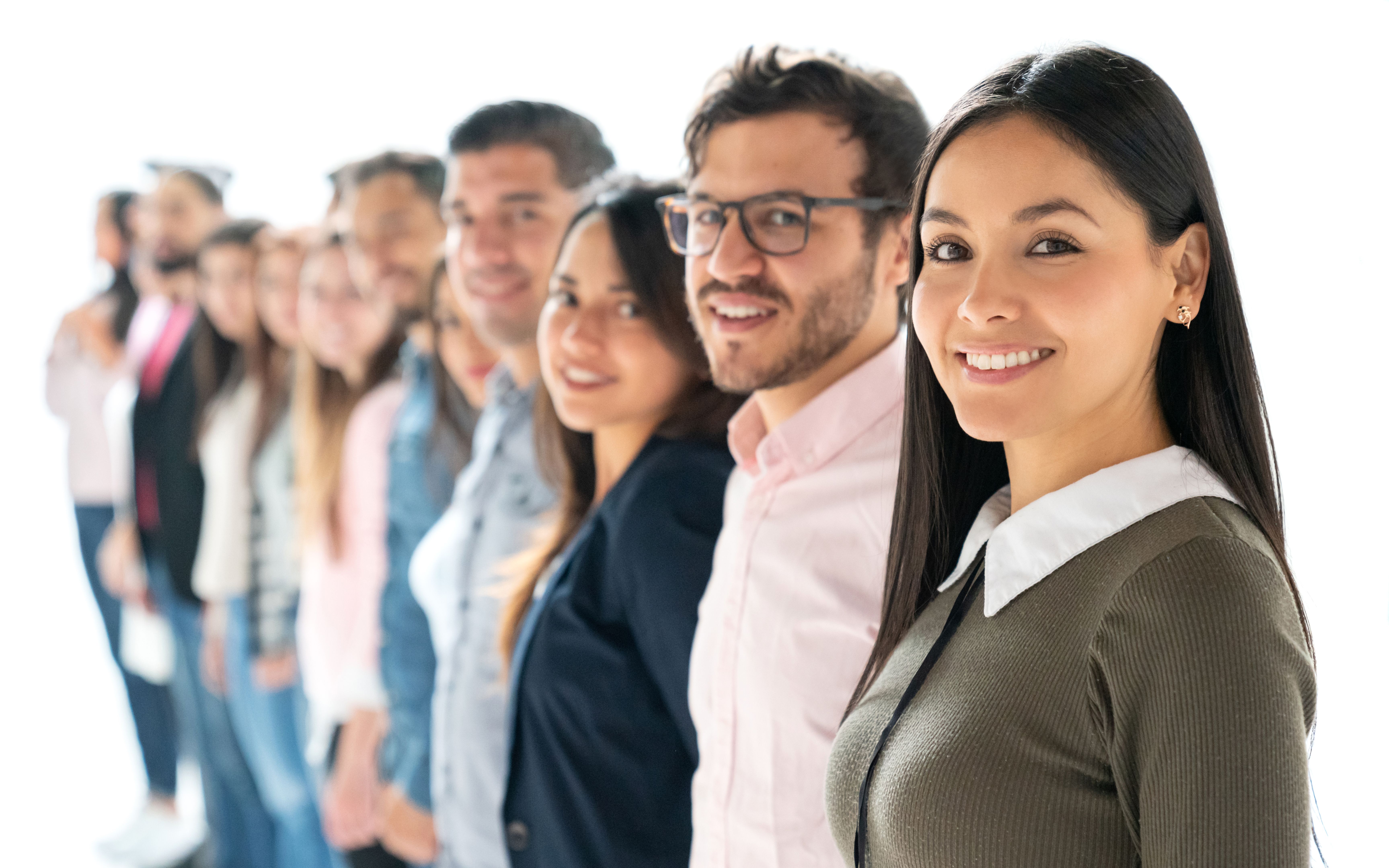 Profile portrait of a group of people in a row at the studio