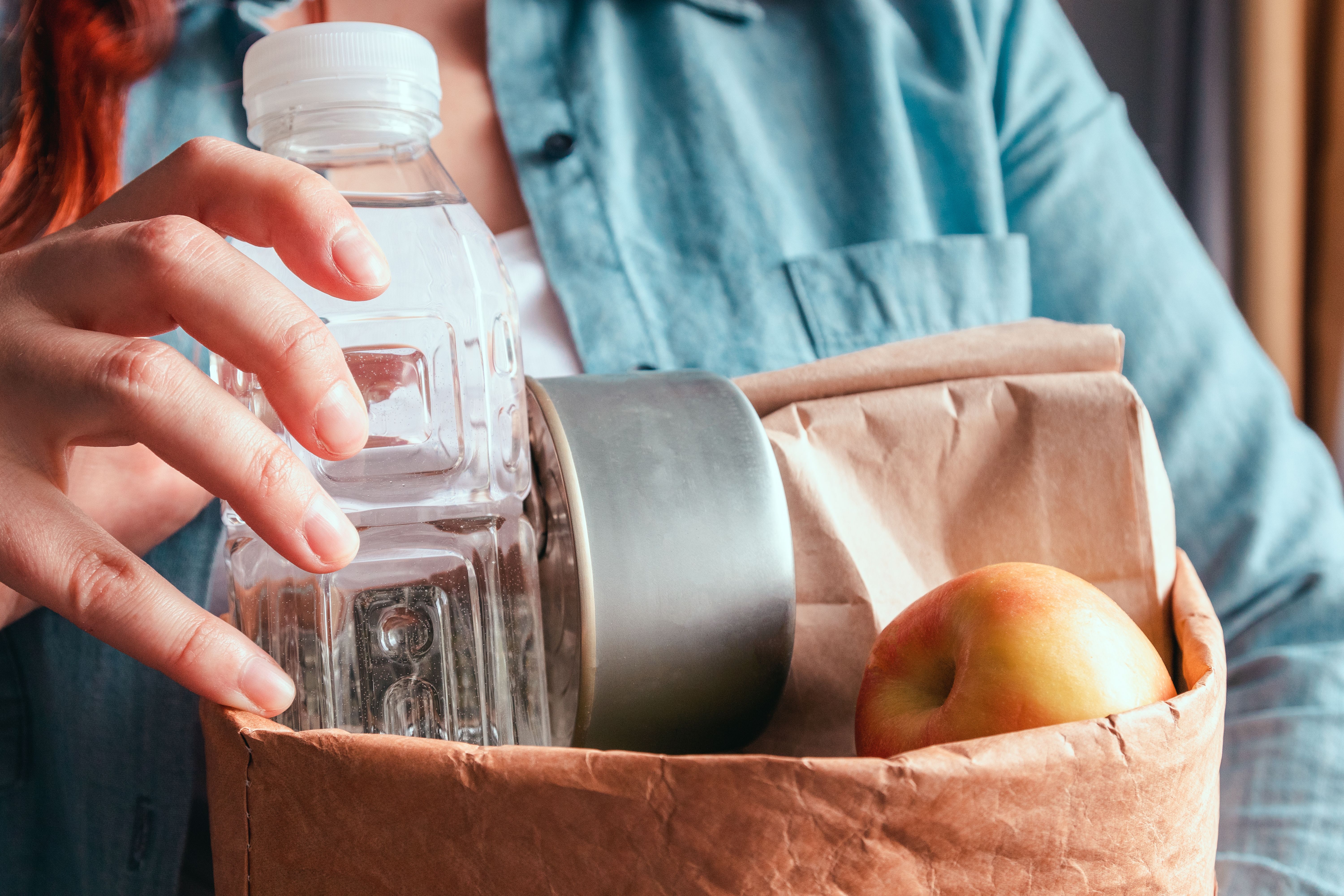 Donation box with various food. Open cardboard box with oil, vegetables, milk, canned food, cereals and pasta. Food delivery concept Donation box with various food. Open cardboard box with oil, vegetables, milk, canned food, cereals and pasta. Food delivery concept