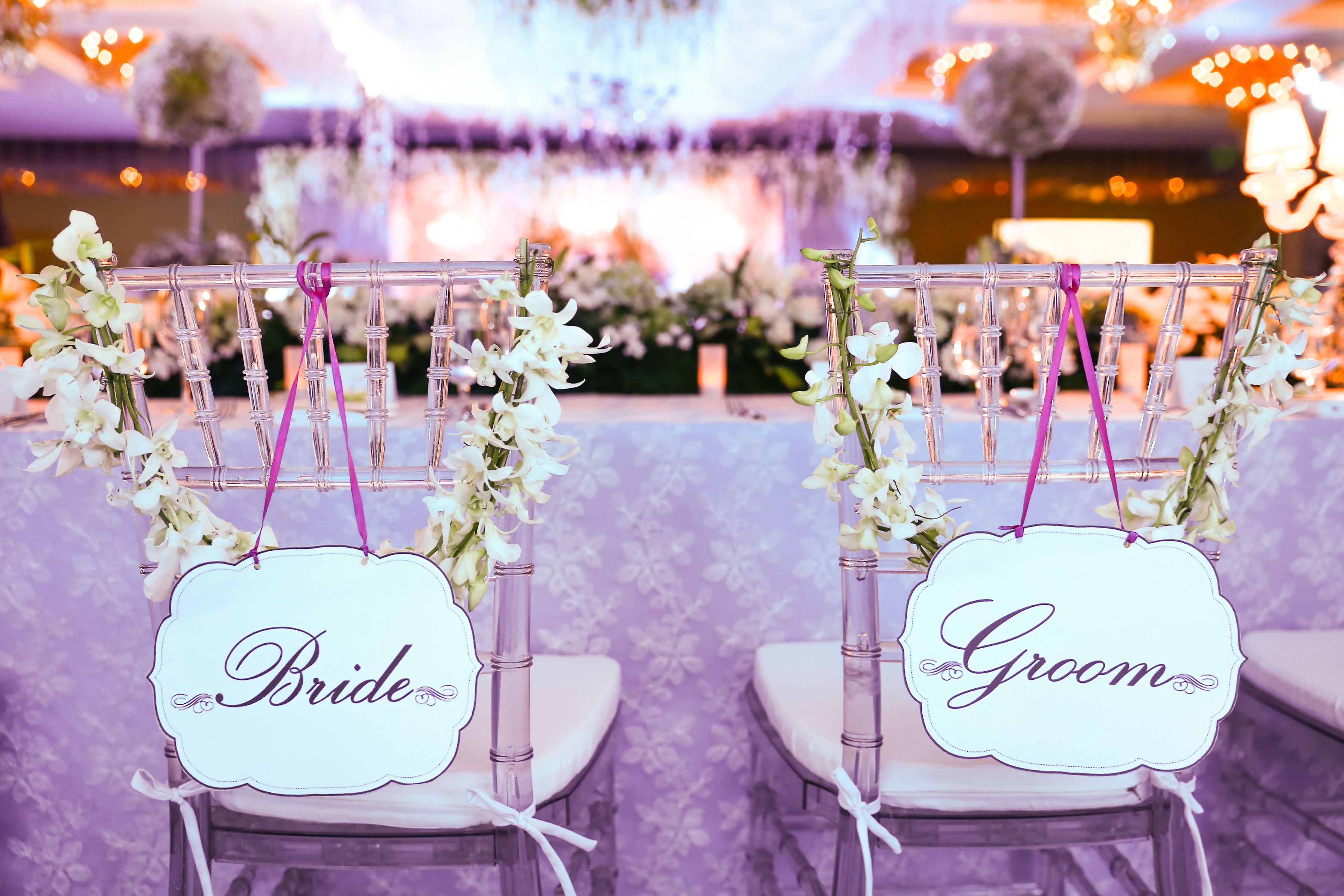 Bride and groom chair at wedding reception Bride and groom chair at wedding reception