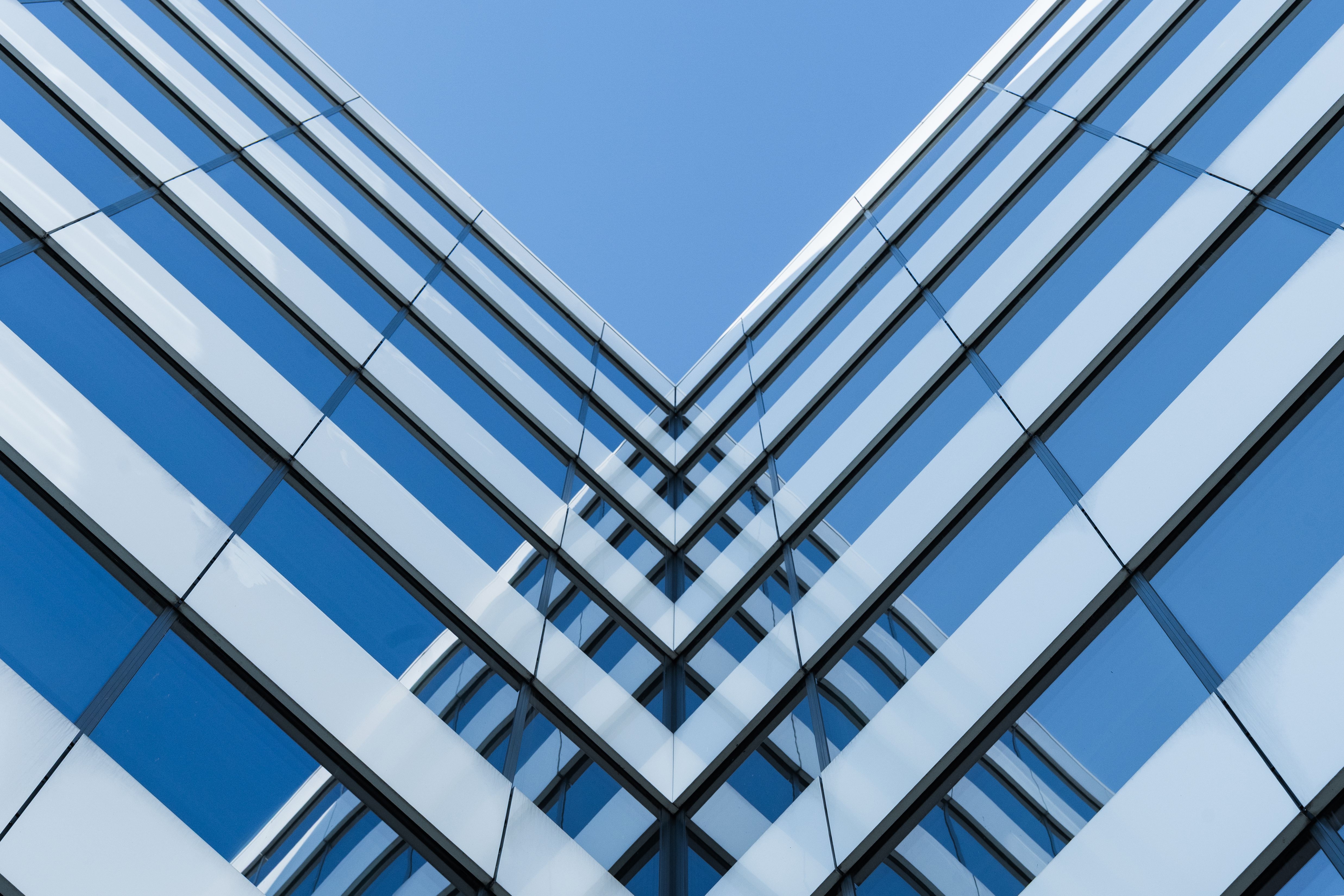 Modern Glass Building Symmetrical Facade Reflection