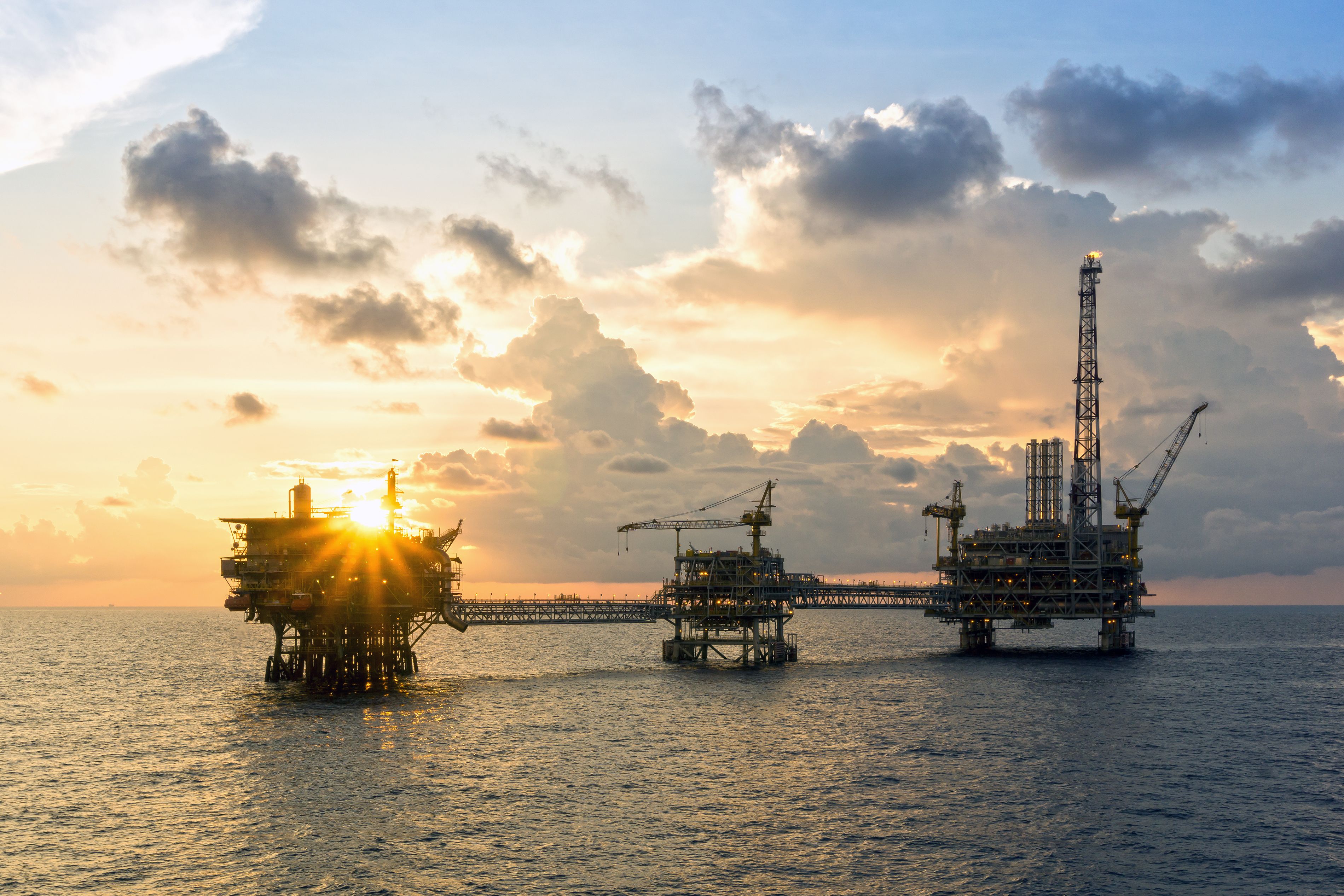 Seascape Of Oil Production Platform During Golden Hour At Offshore Terengganu Oil Field Seascape Of Oil Production Platform During Golden Hour At Offshore Terengganu Oil Field