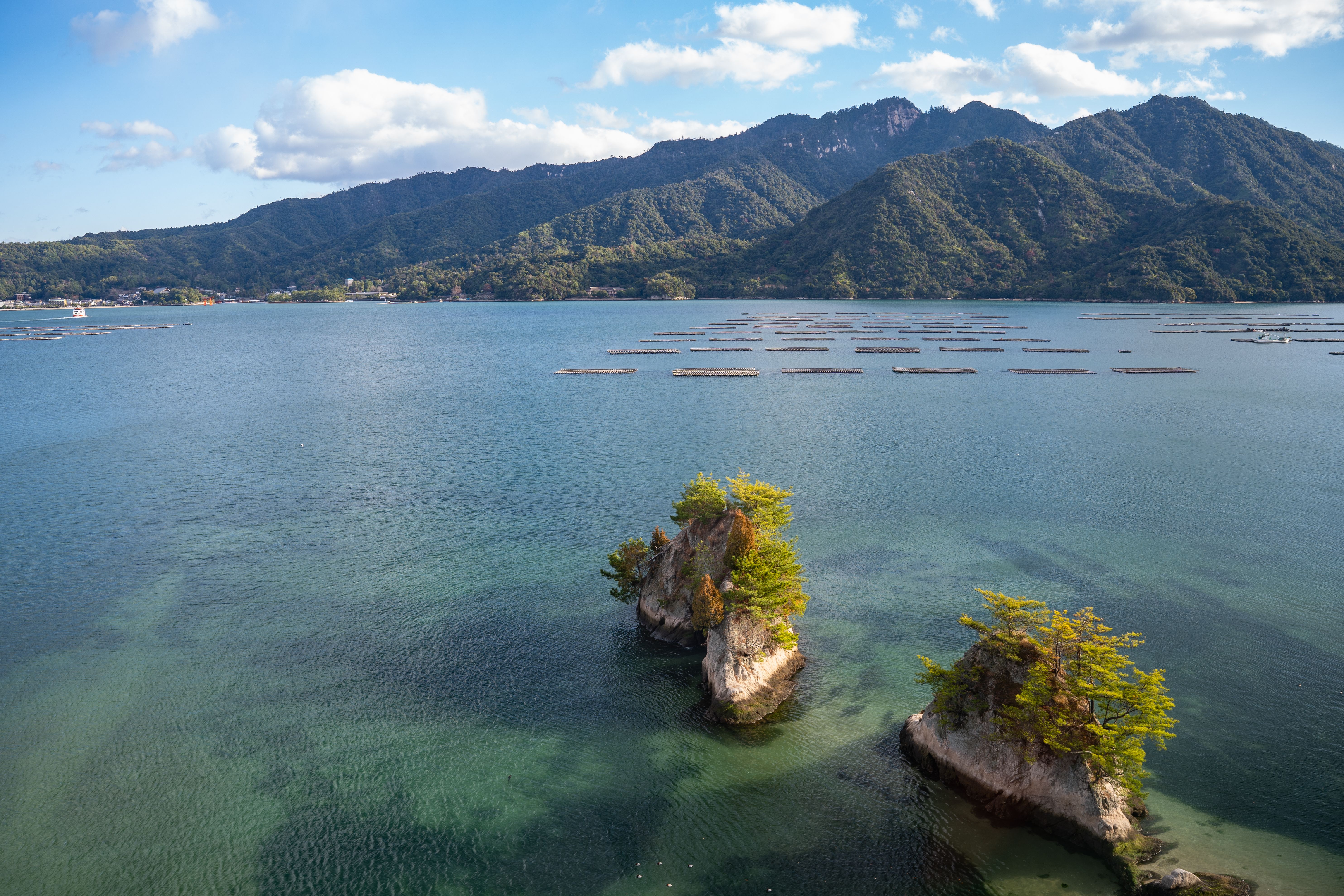 Scenery of Miyajima Island and the Seto Inland Sea. Miyajima can be reached by regular ferry. Scenery of Miyajima Island and the Seto Inland Sea. Miyajima can be reached by regular ferry.
