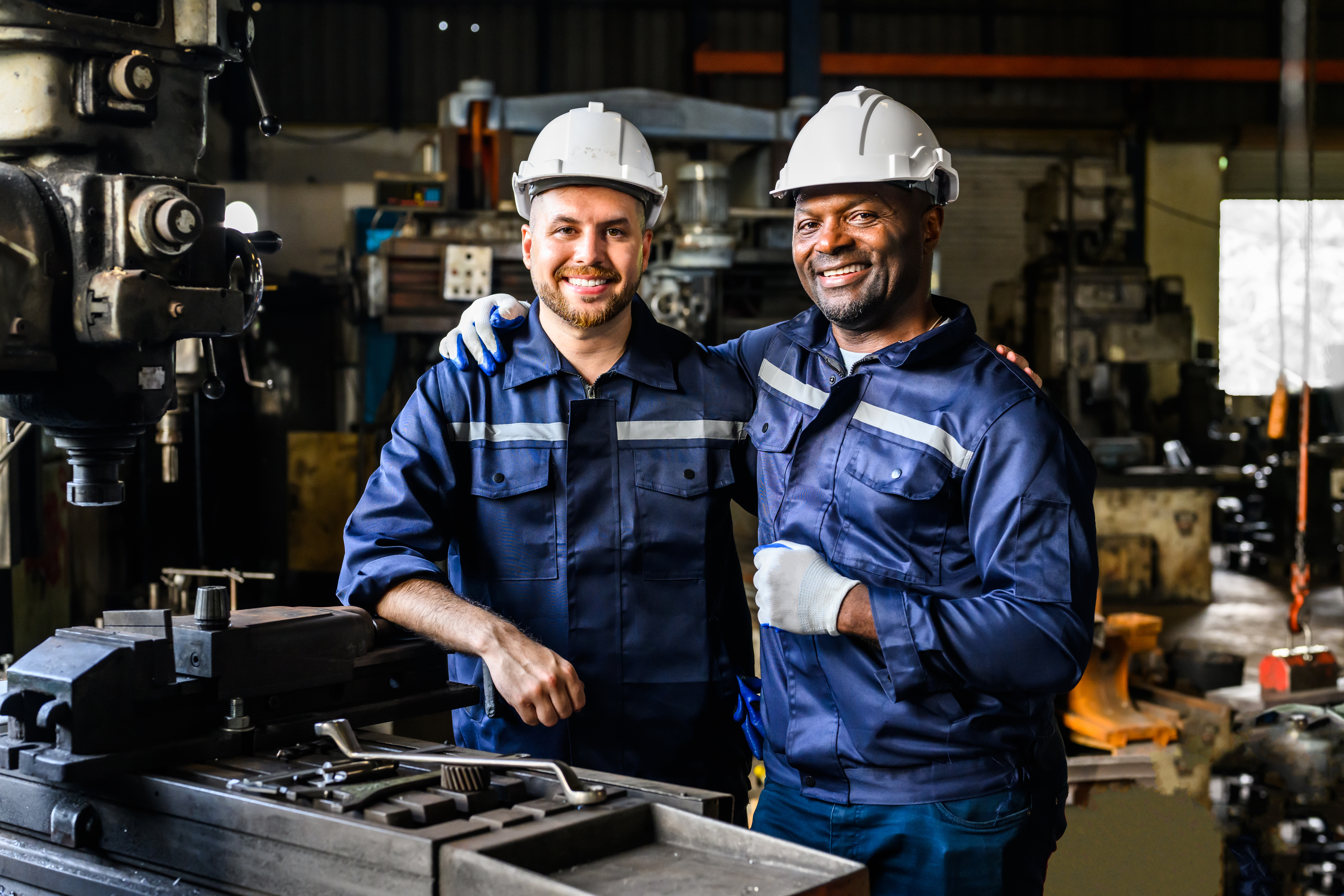 Portrait of professional mechanical engineer team checking and repairing engine