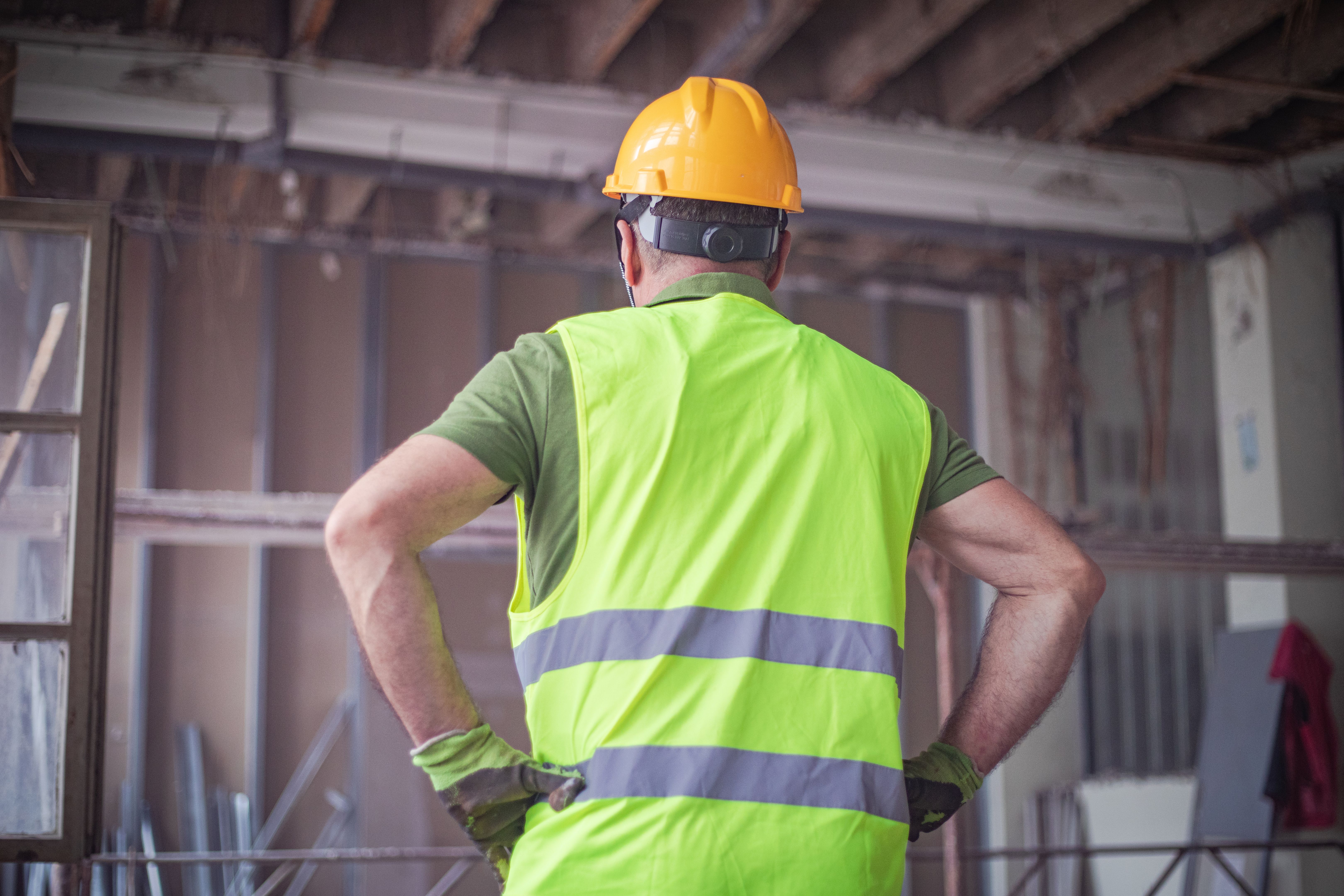 A construction engineer controls the construction site A construction engineer controls the construction site