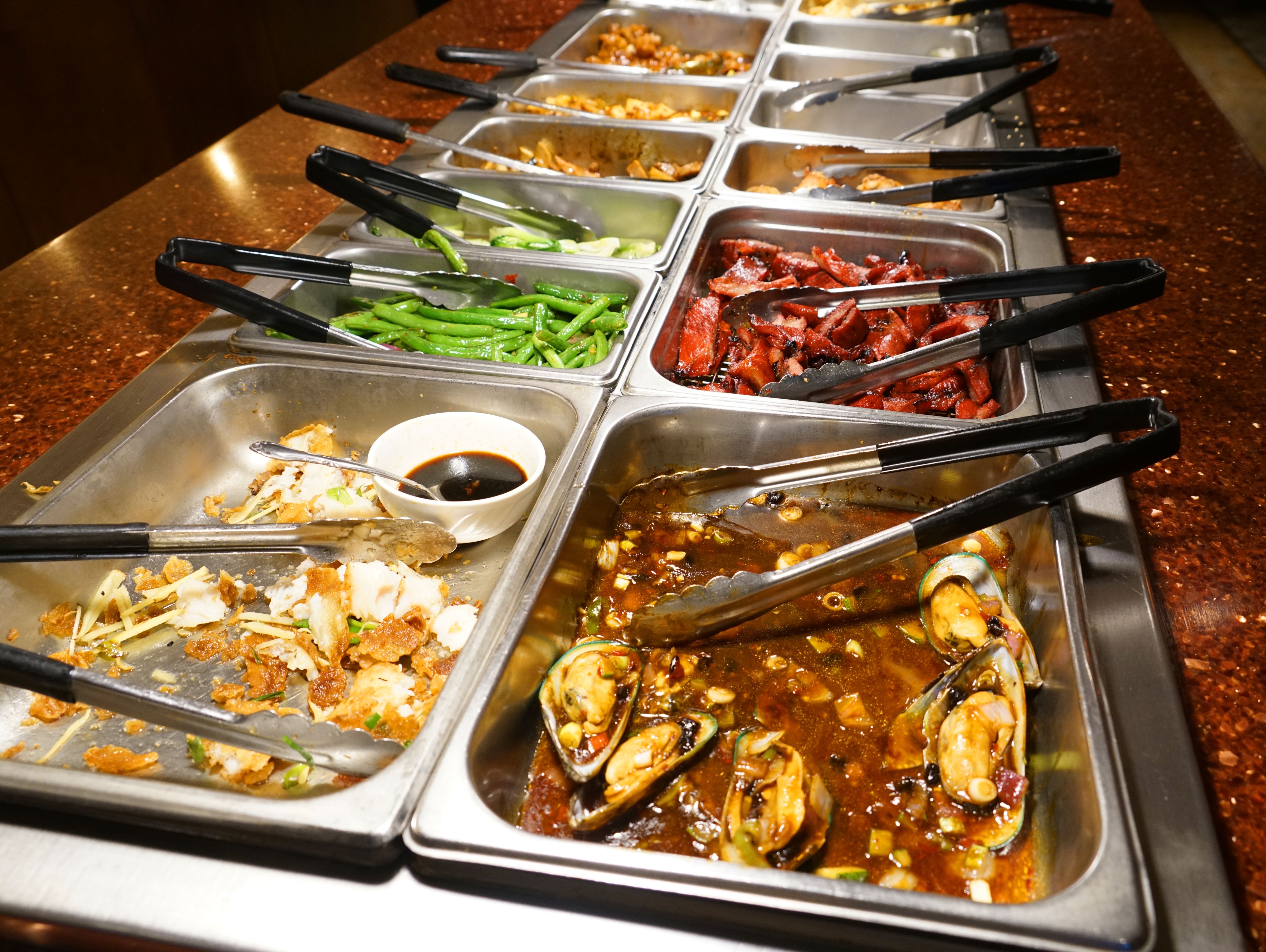 Chinese food buffet with various food in the restaurant Chinese food buffet with various food in the restaurant