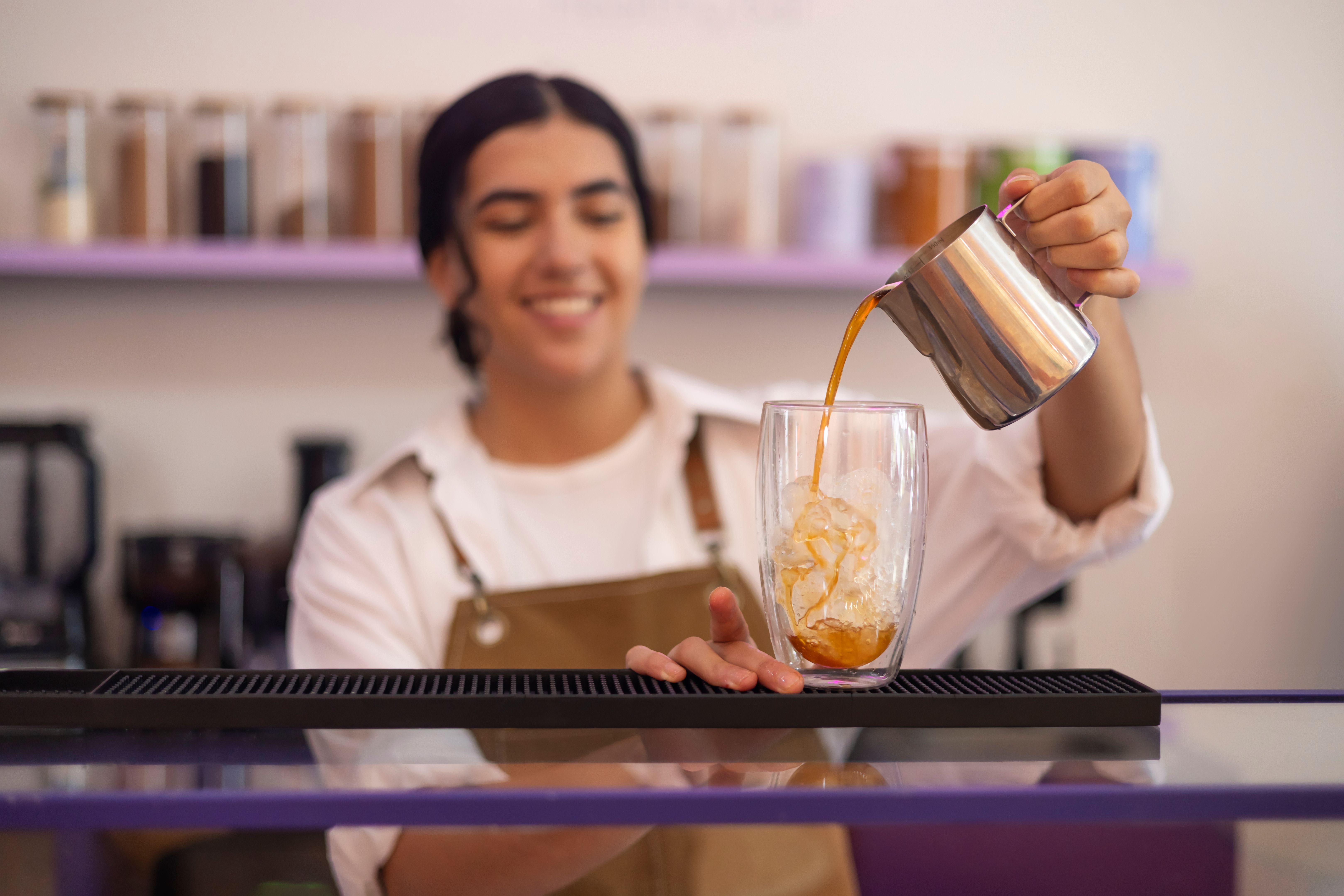 barista making drink