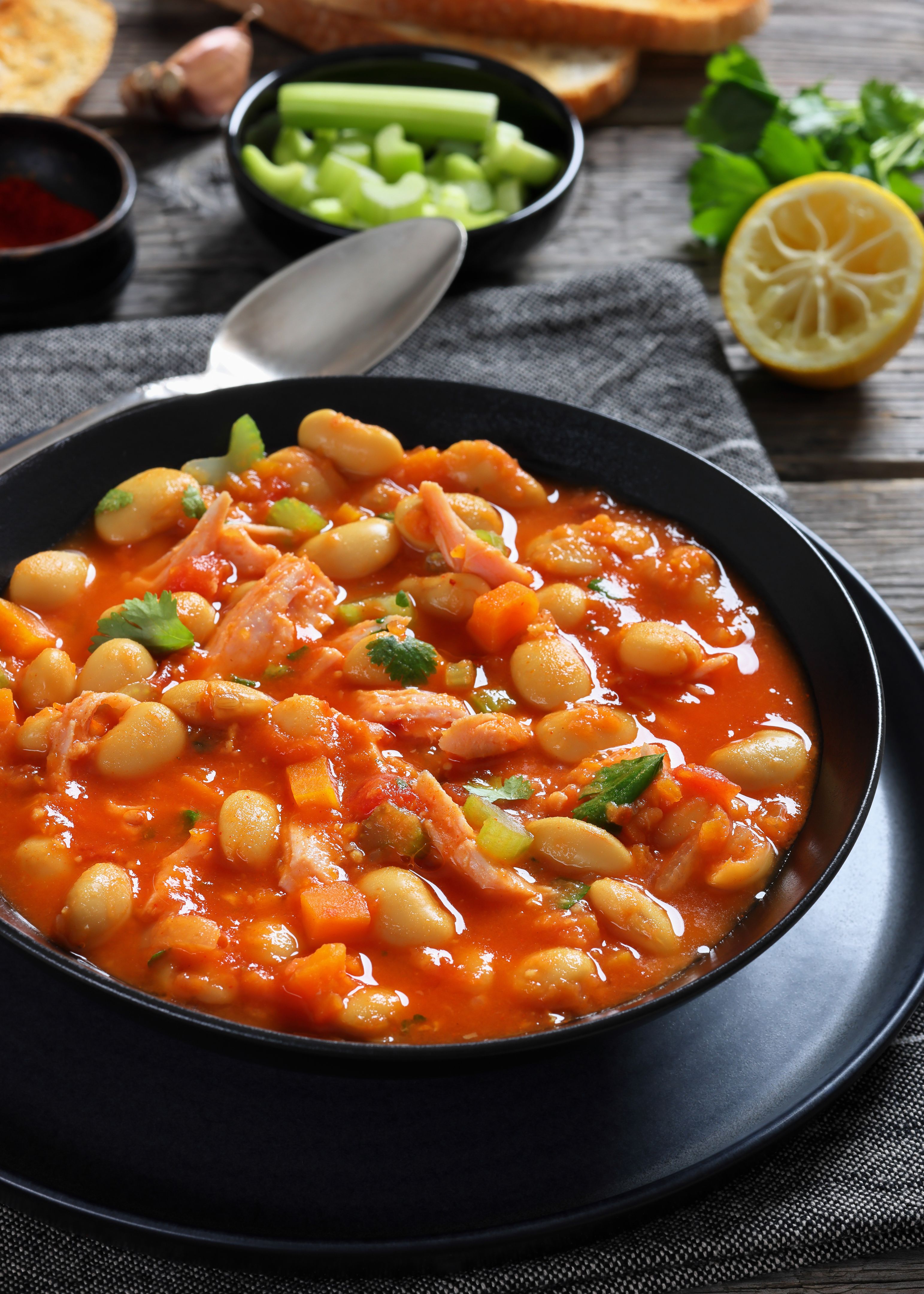 Pasulj, white bean soup with chicken in bowl