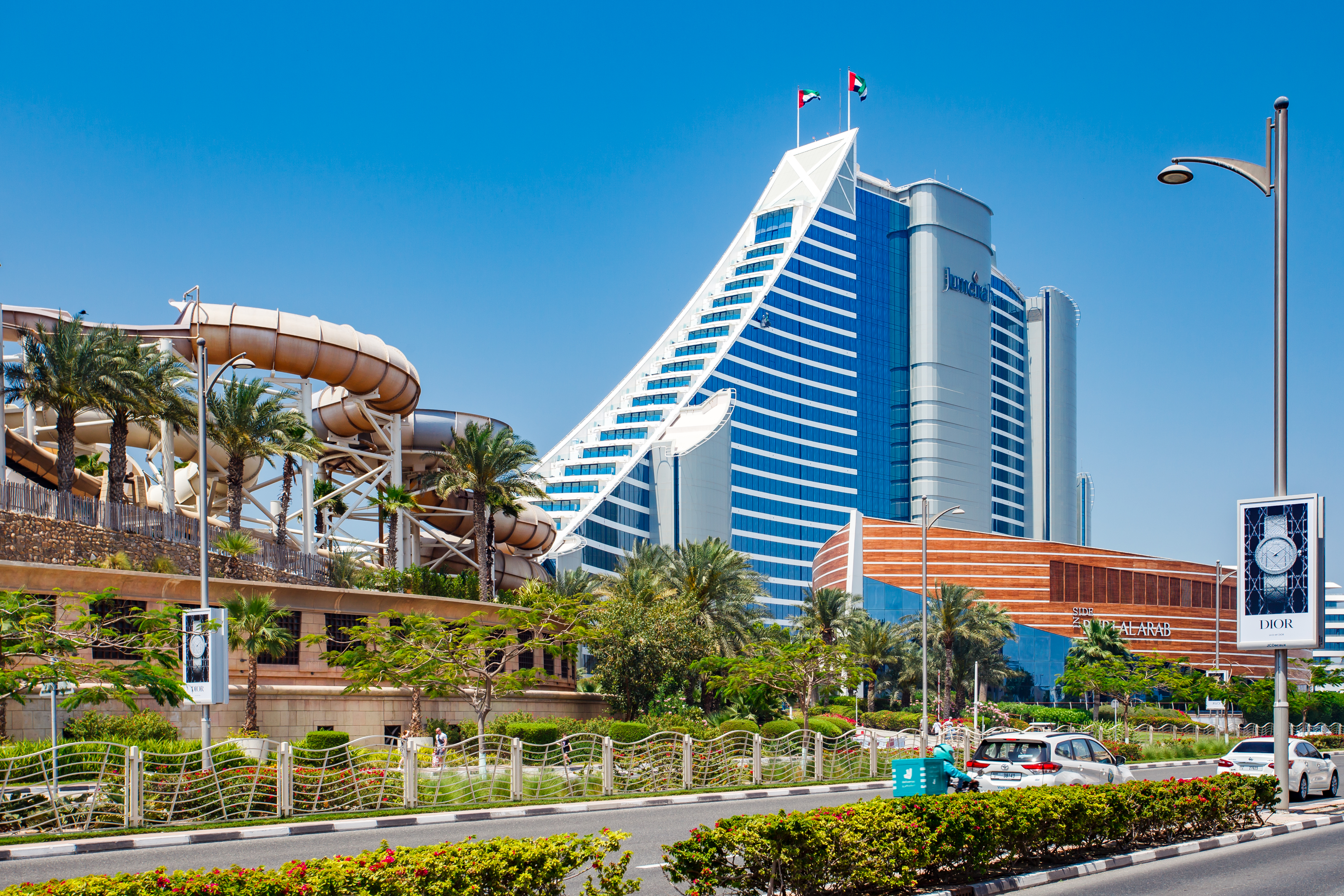 Jumeirah Beach Hotel, eastern part at clear day, cars on the road, Wild Wadi Waterpark Dubai