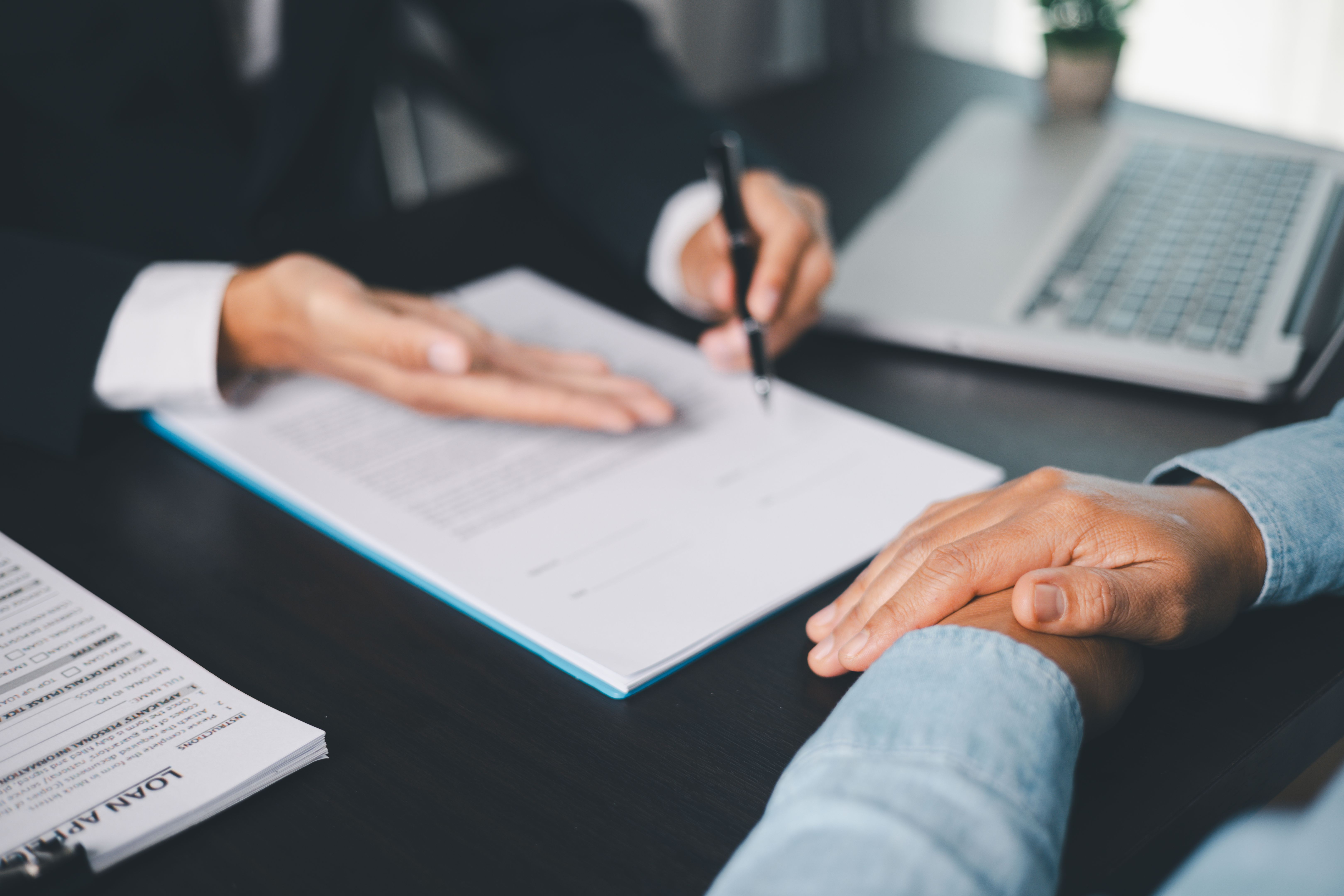 Business people signing contract making deal with life insurance agent Concept for consultant health insurance life insurance savings plan. Approved stamp with Business people contract making deal