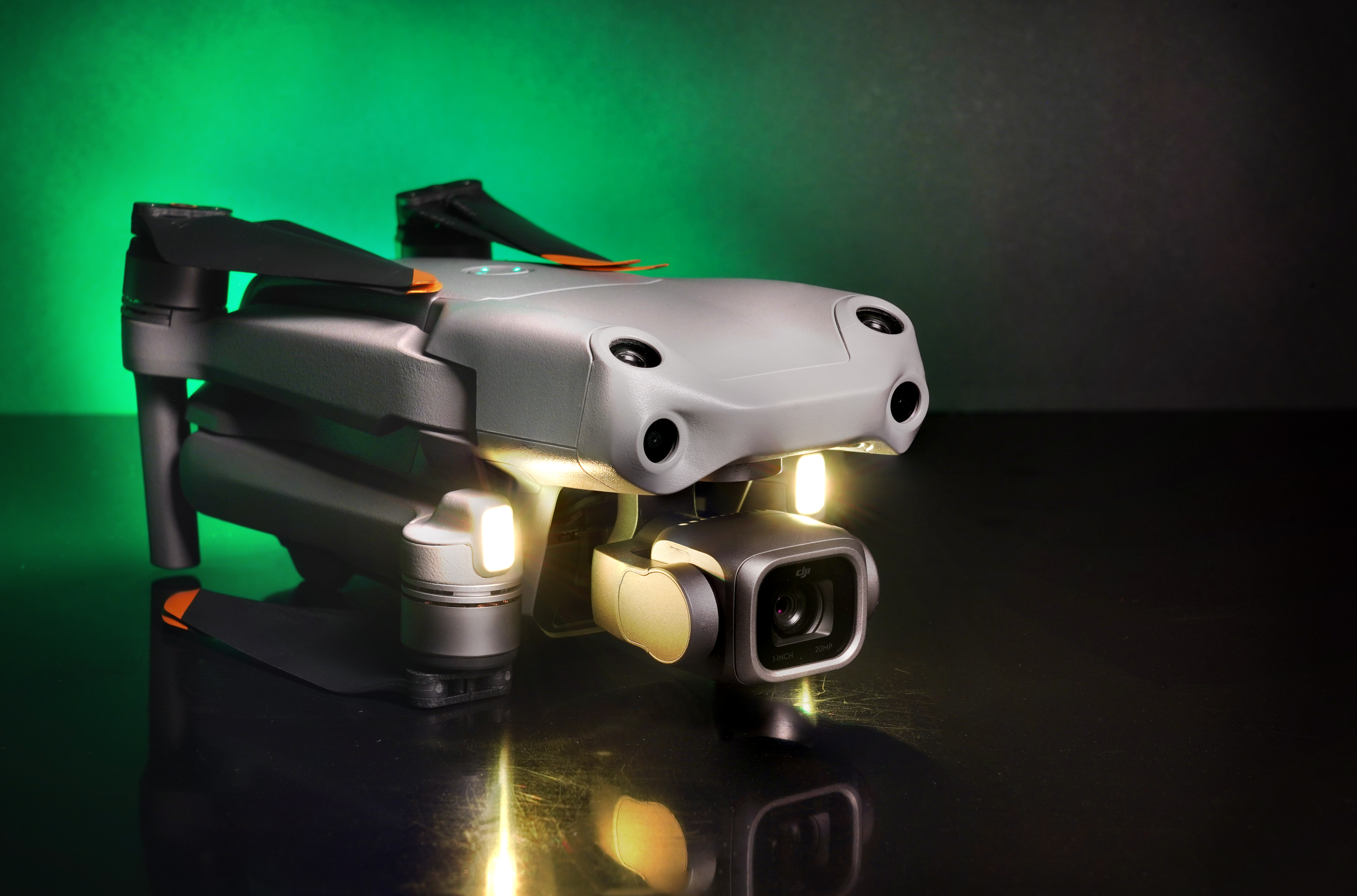 Barcelona, June 18, 2022, dji mavic air 2s the light drone with a 1 inch camera and an incredible flight and performance mini drone with optical sensors.background studio green lights position