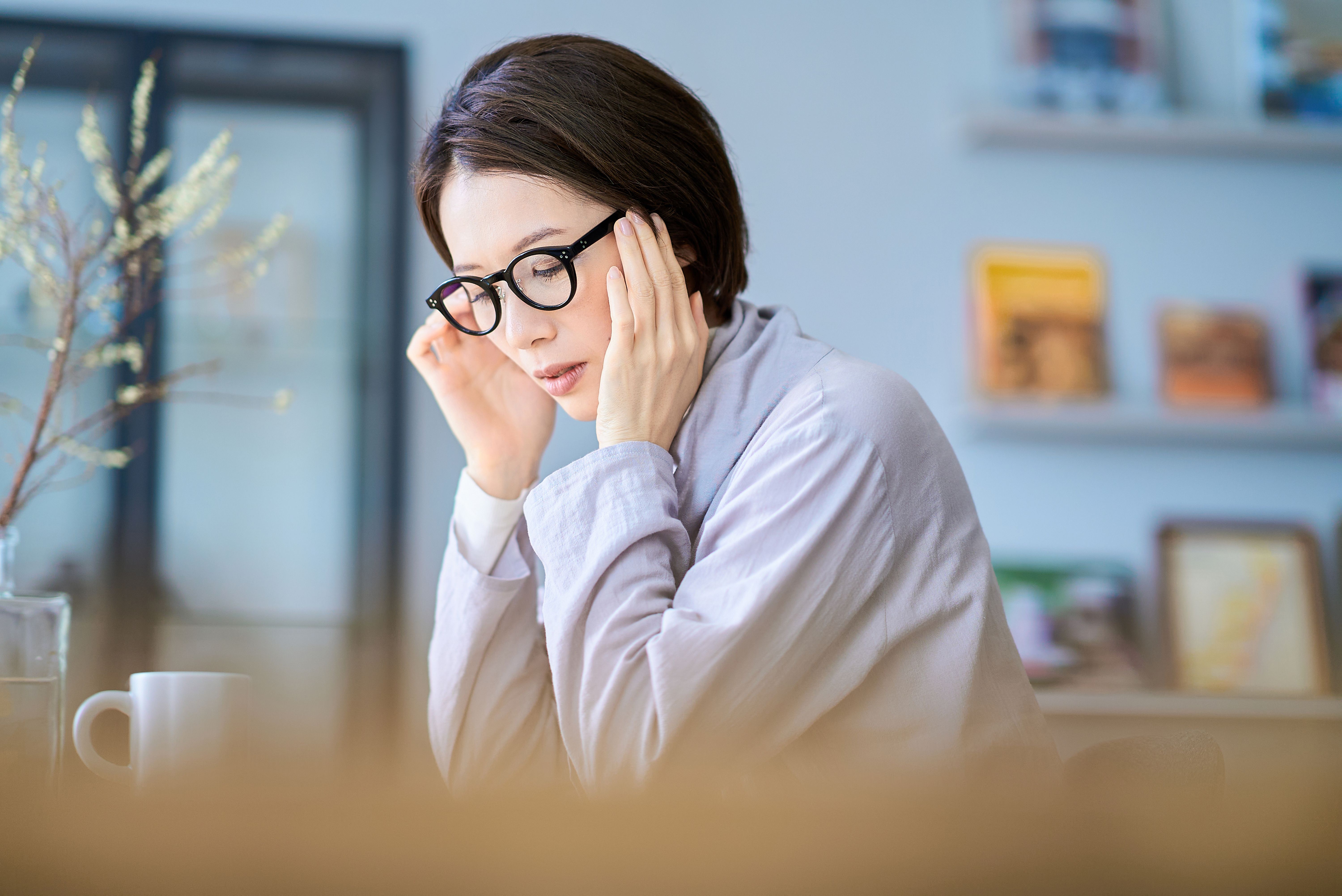 A middle-age woman feel tired