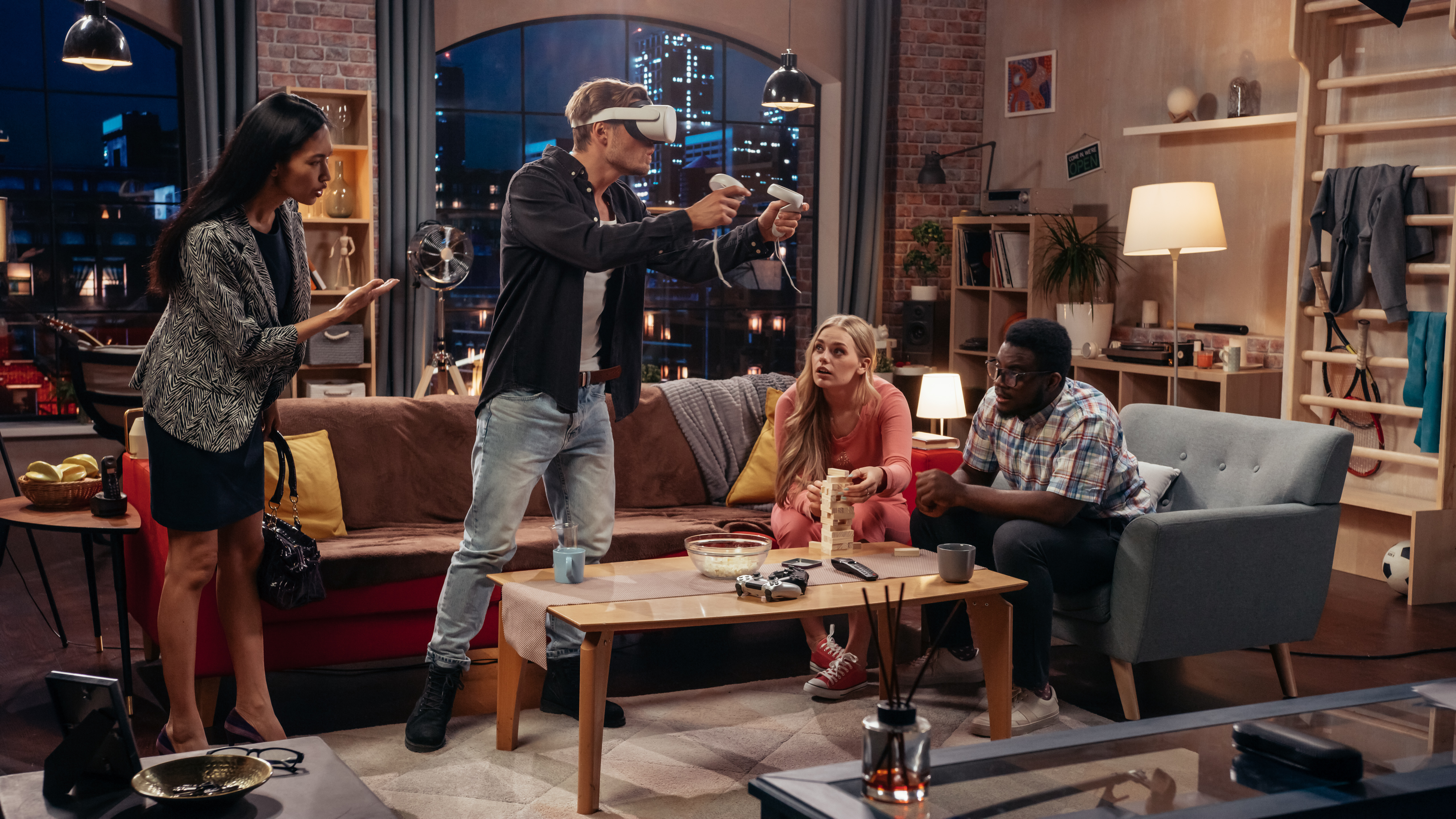 Television Sitcom Concept: Four Friends have Fun in Living Room. Funny Sketch About Two Couples. Guy in VR Headset has Metaverse Addiction. Comedy Show Broadcast on Cable Channel, Streaming Service.