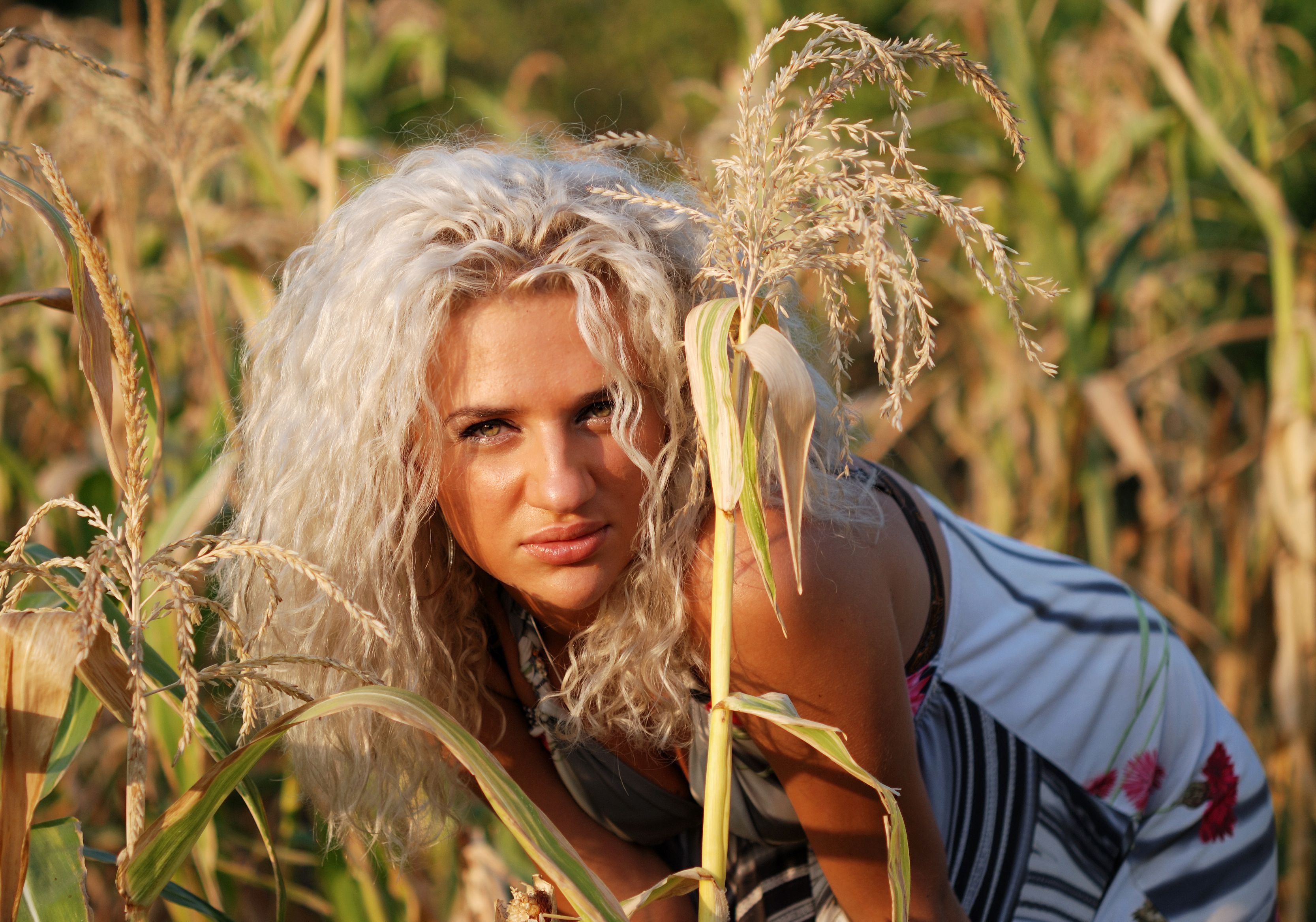 Young girl in corn relaxing