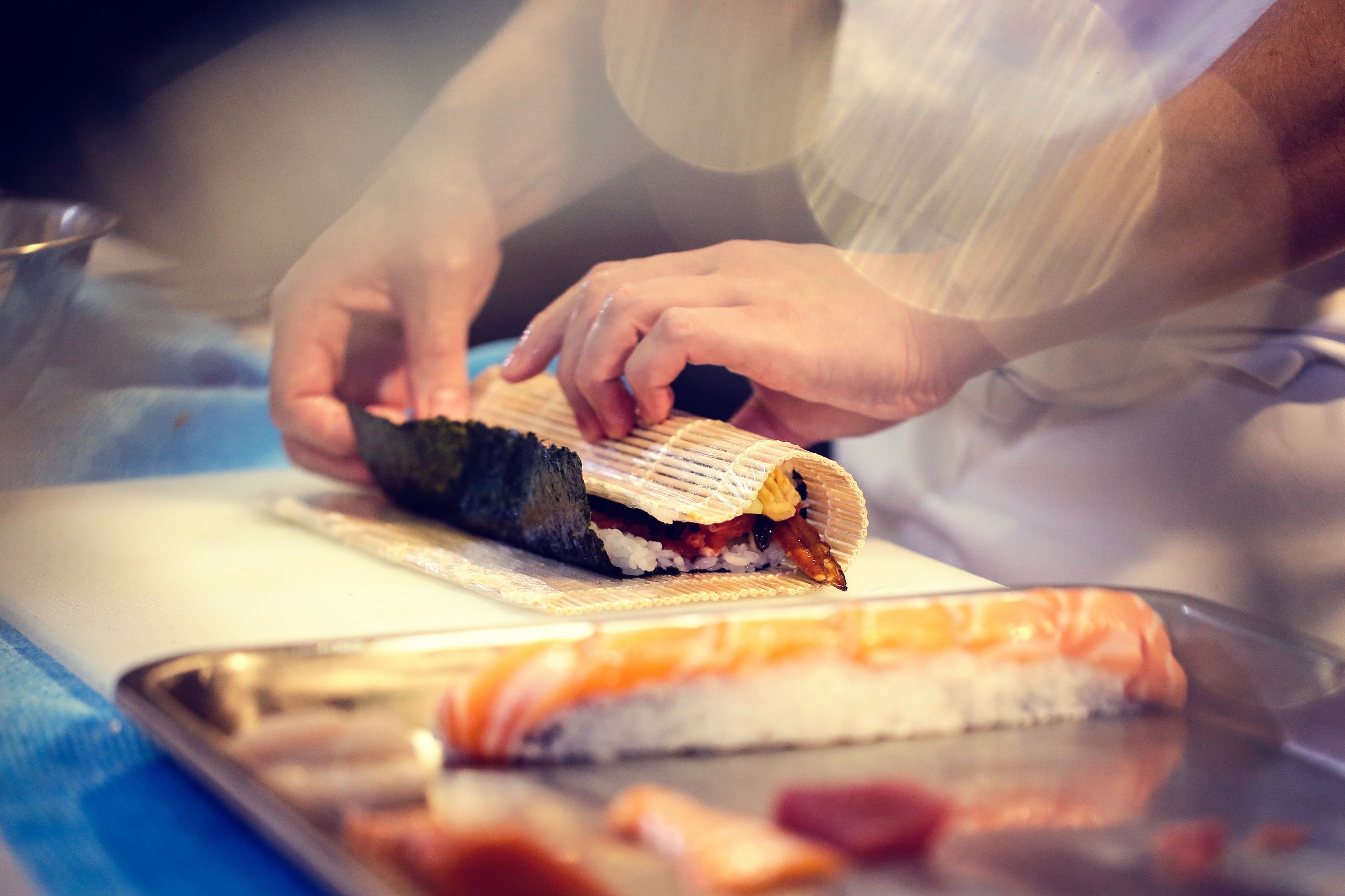chef preparing sushi