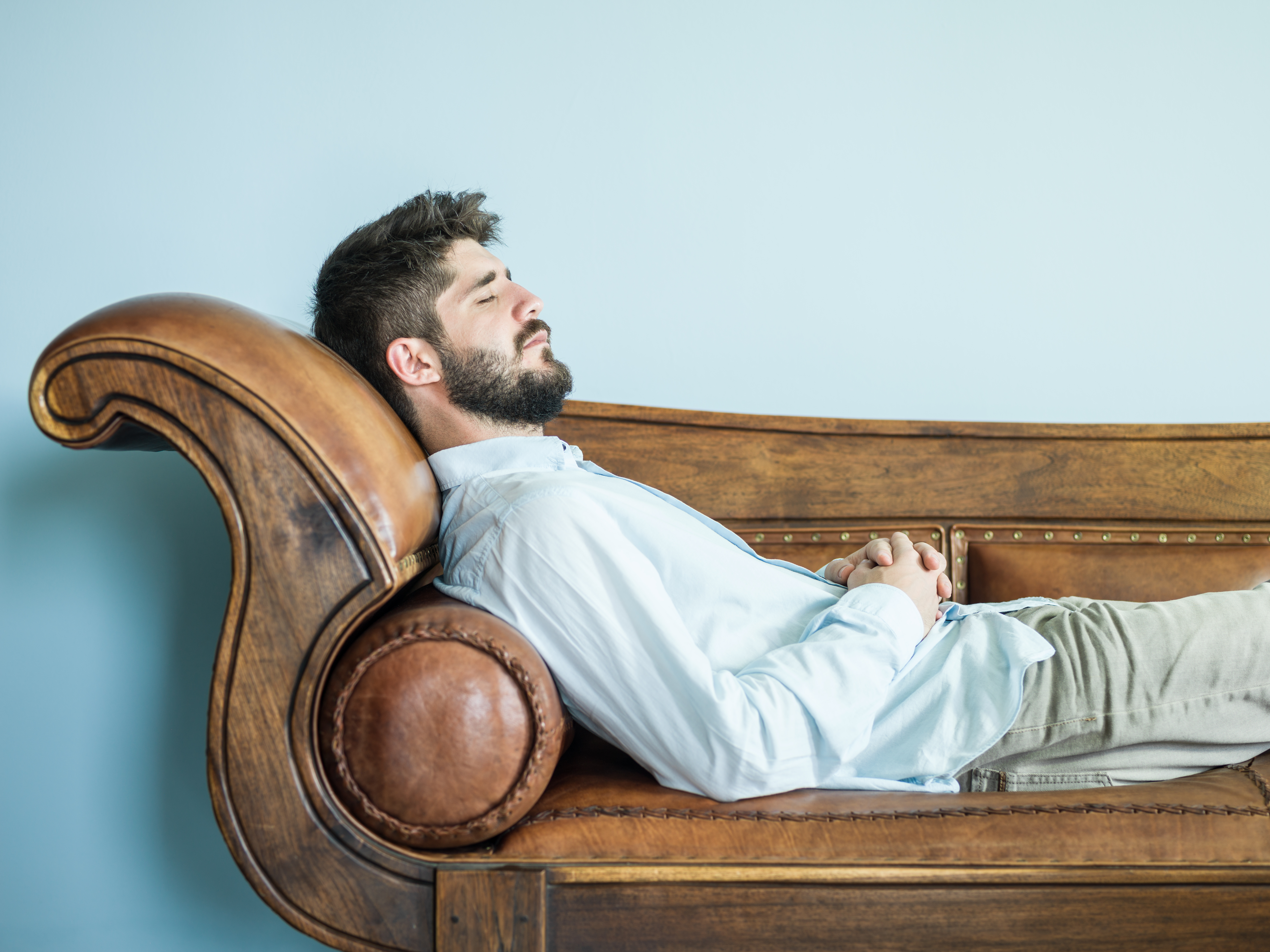 Adult Man Lying Down On Psychiatrist Couch Adult Man Lying Down On Psychiatrist Couch