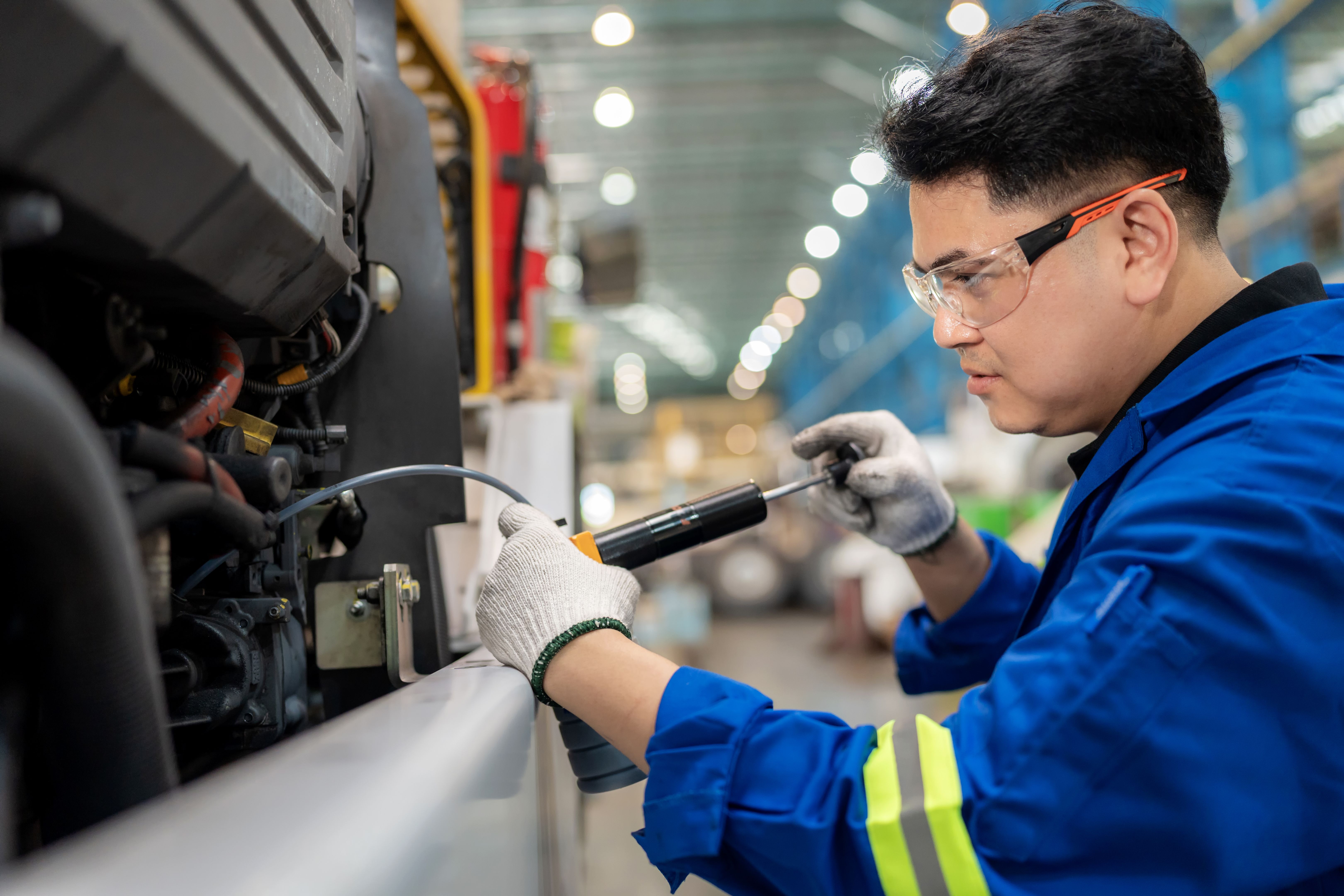 technician repairing equipment