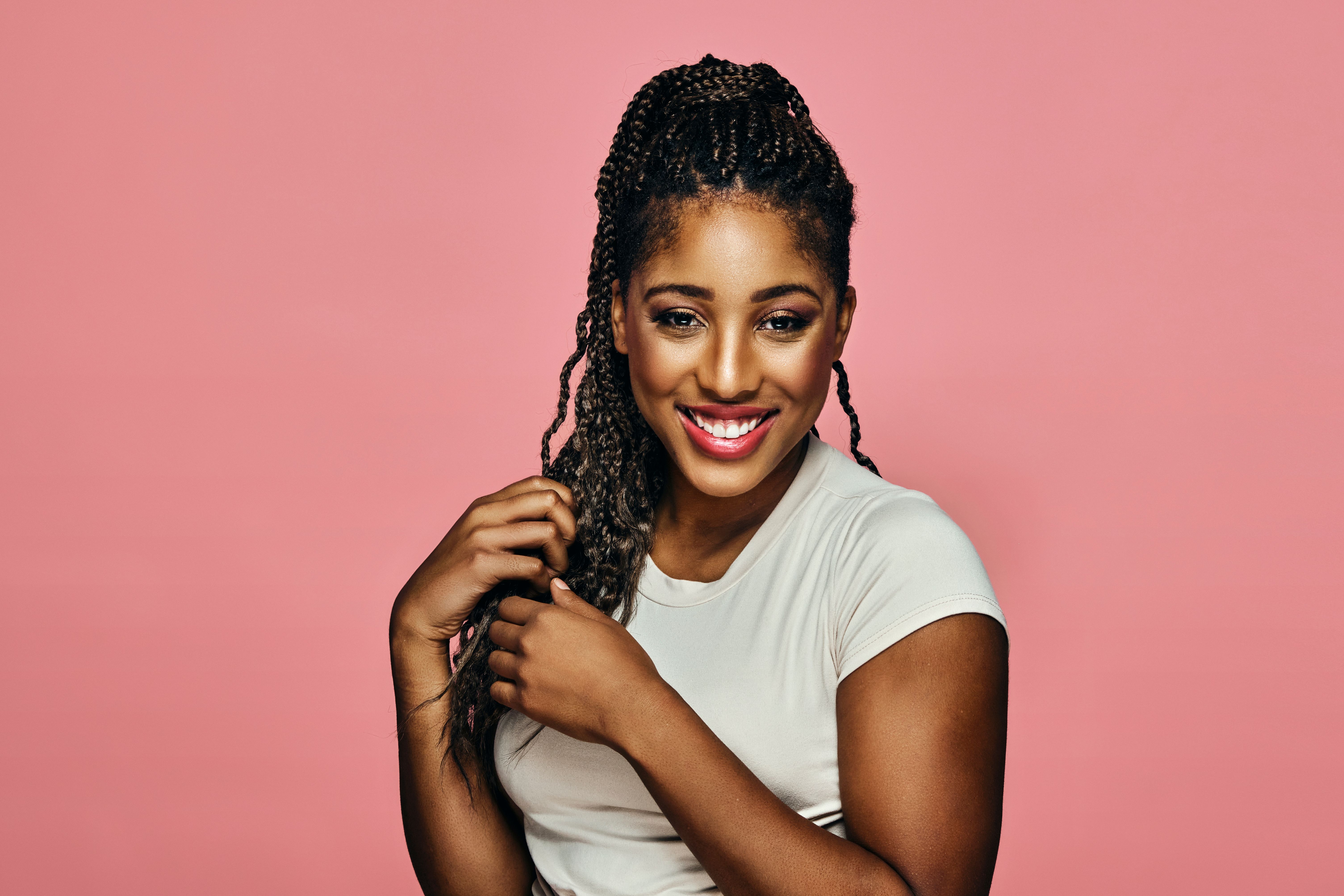 woman removing braids