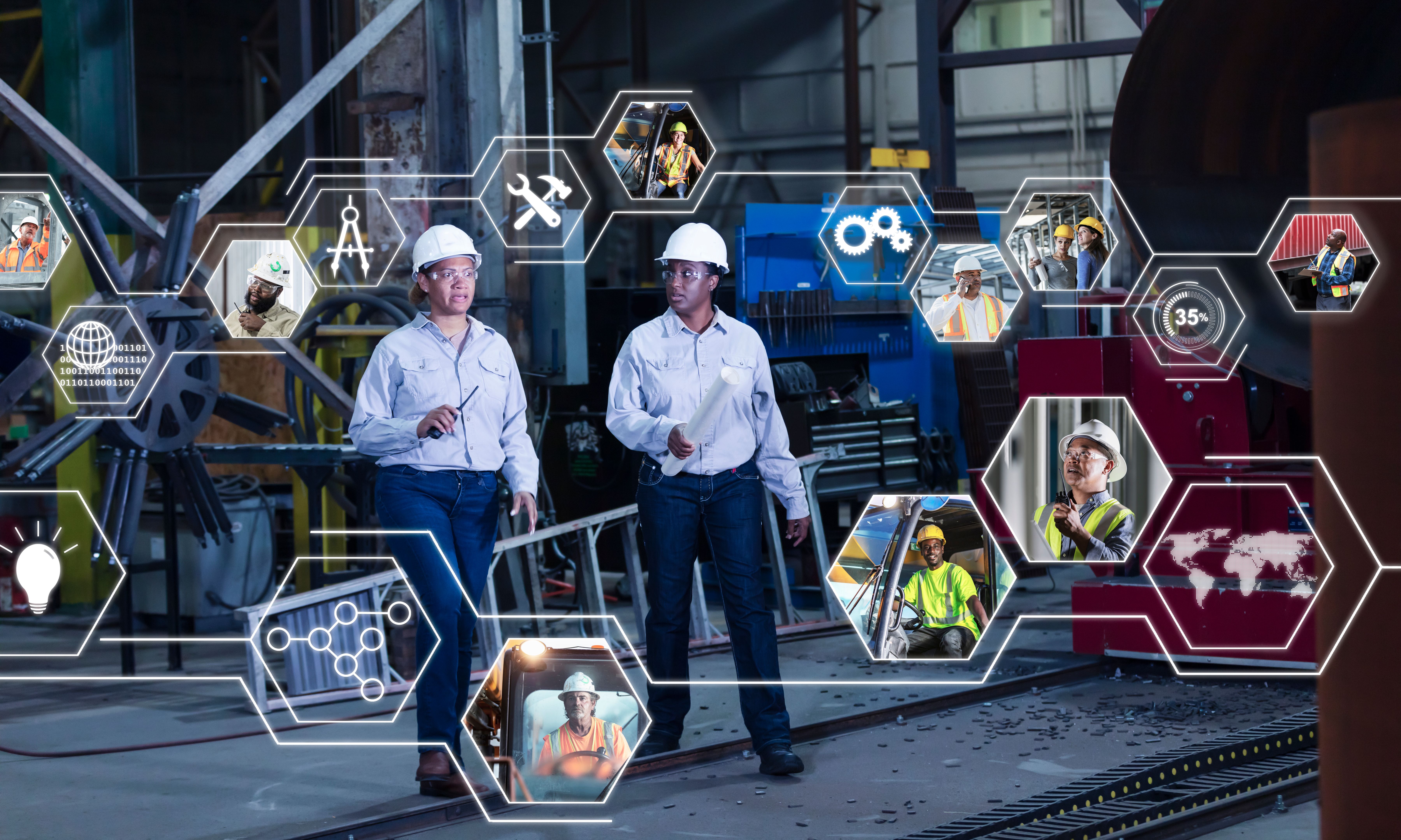Two multiracial women engineers, global manufacturing