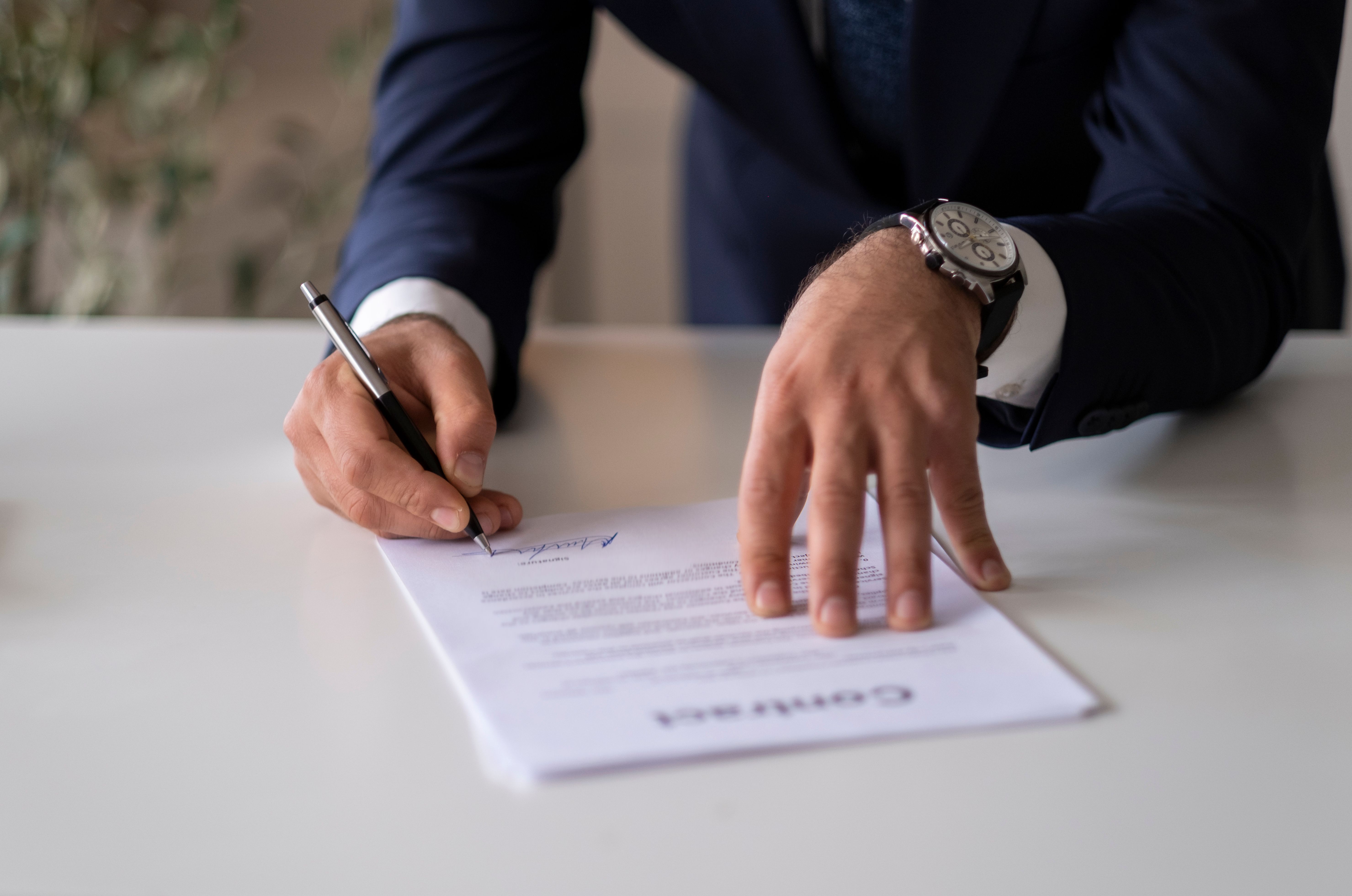 Business contract signing.