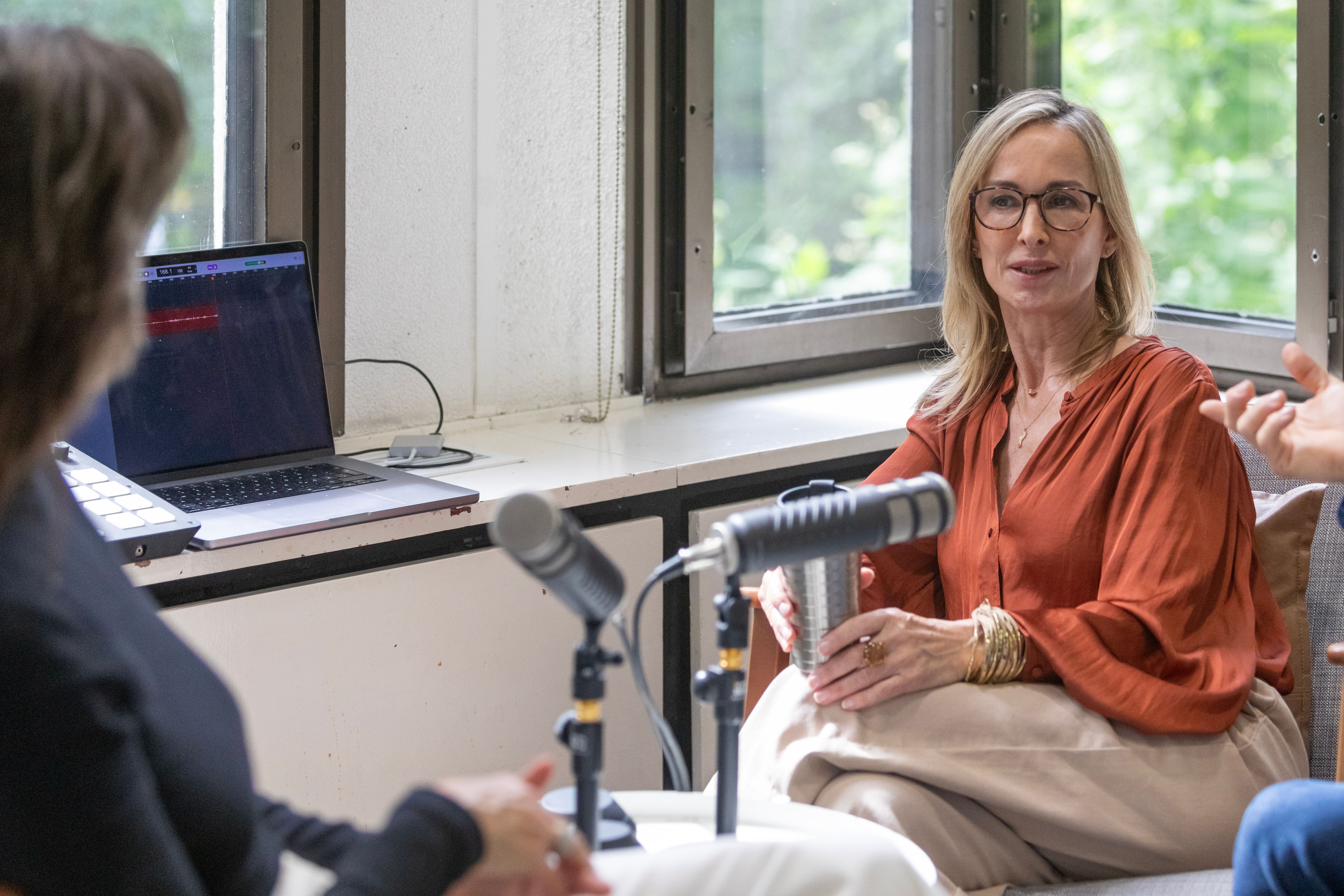 Women recording a podcast Women recording a podcast