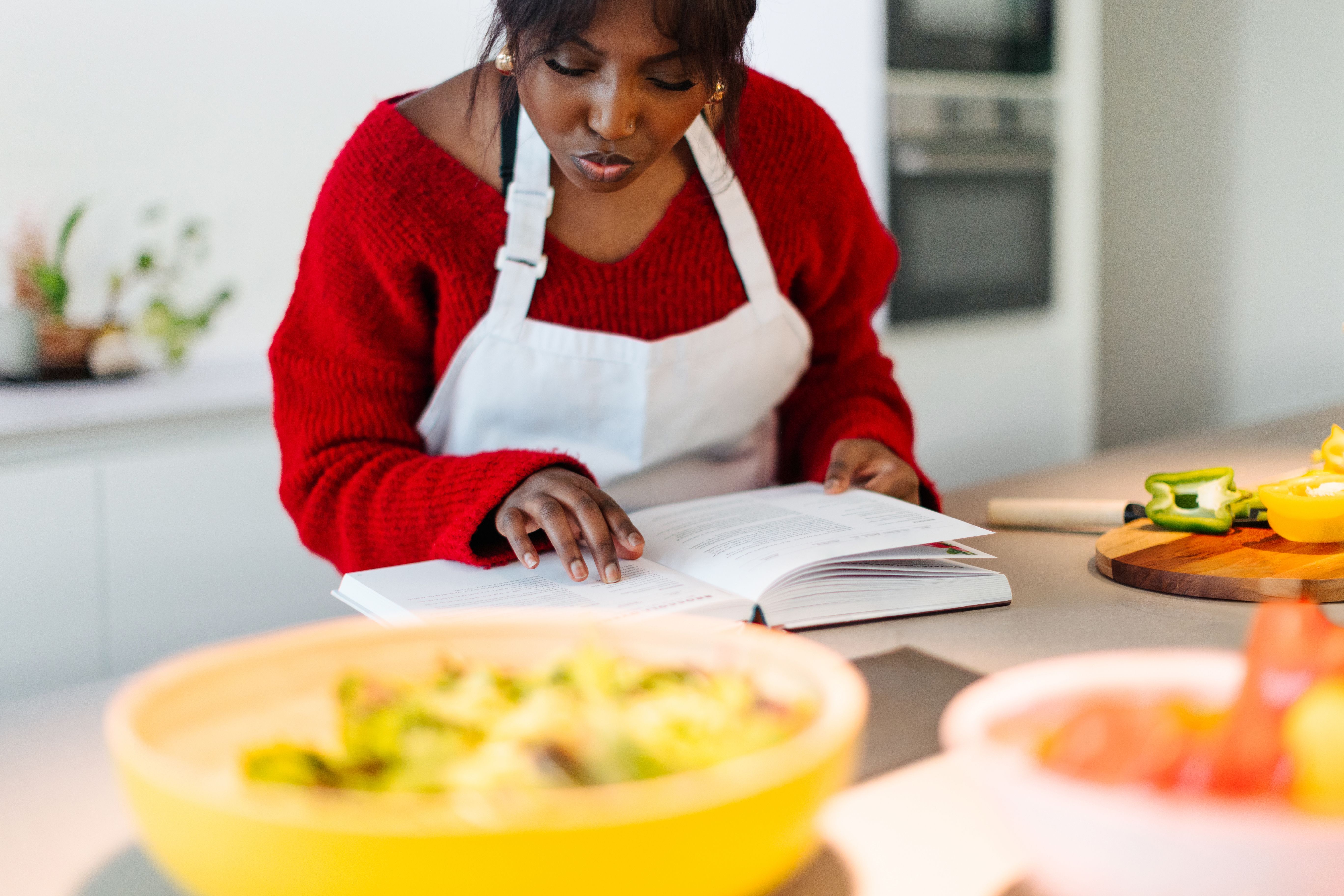 chef reading cookbook