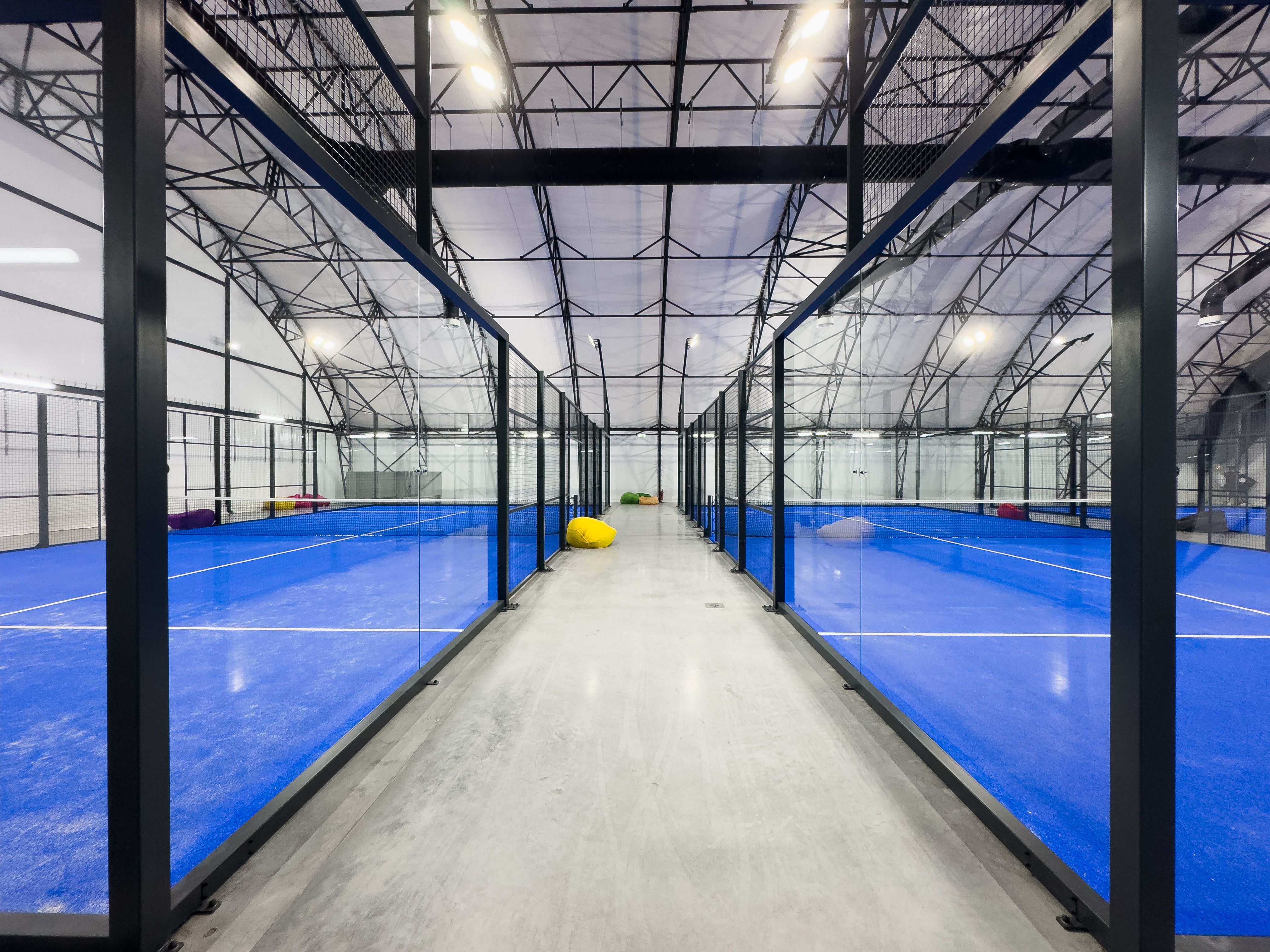 Padel court with lines and net indoor