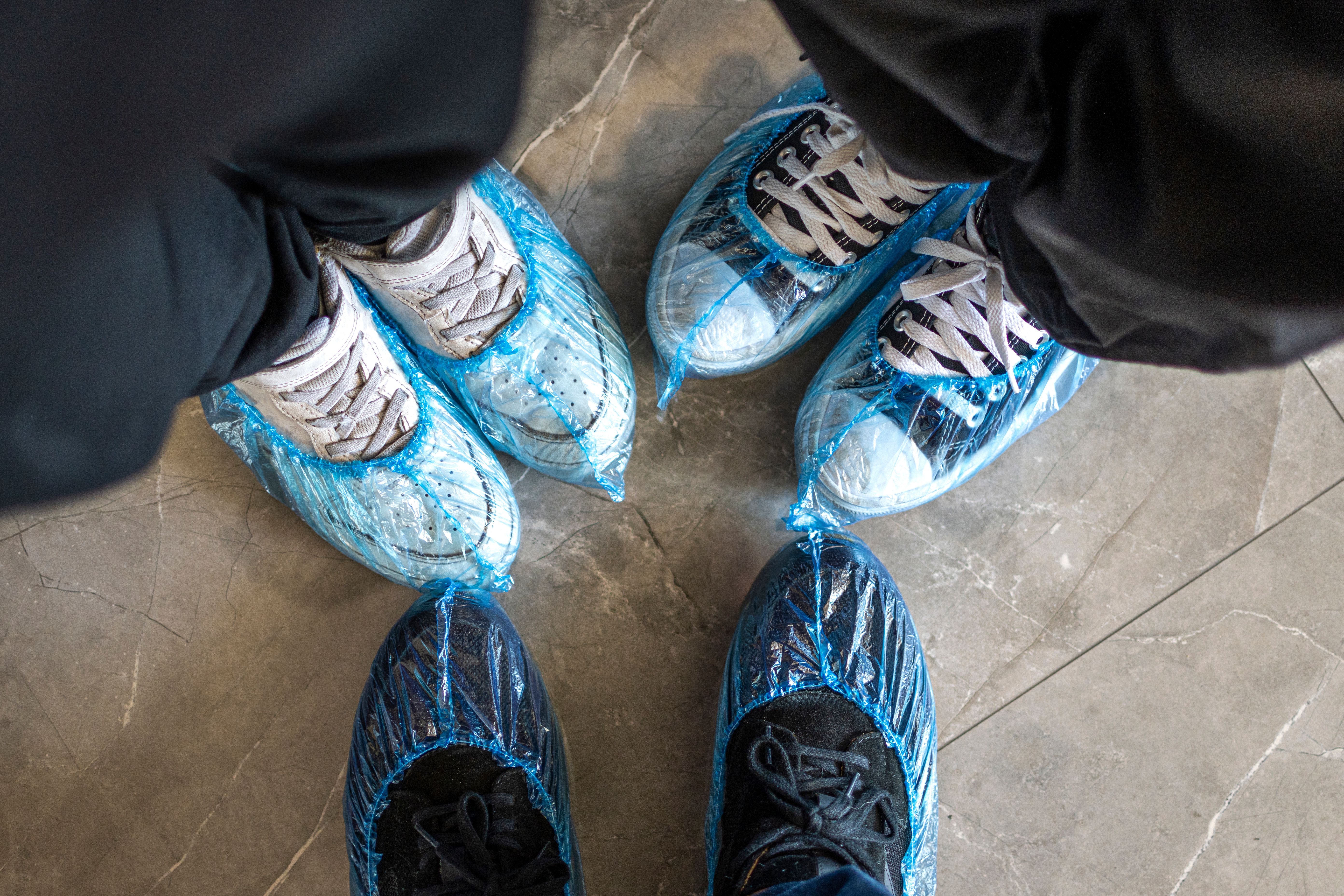 Disposable blue shoe covers for hospital visits