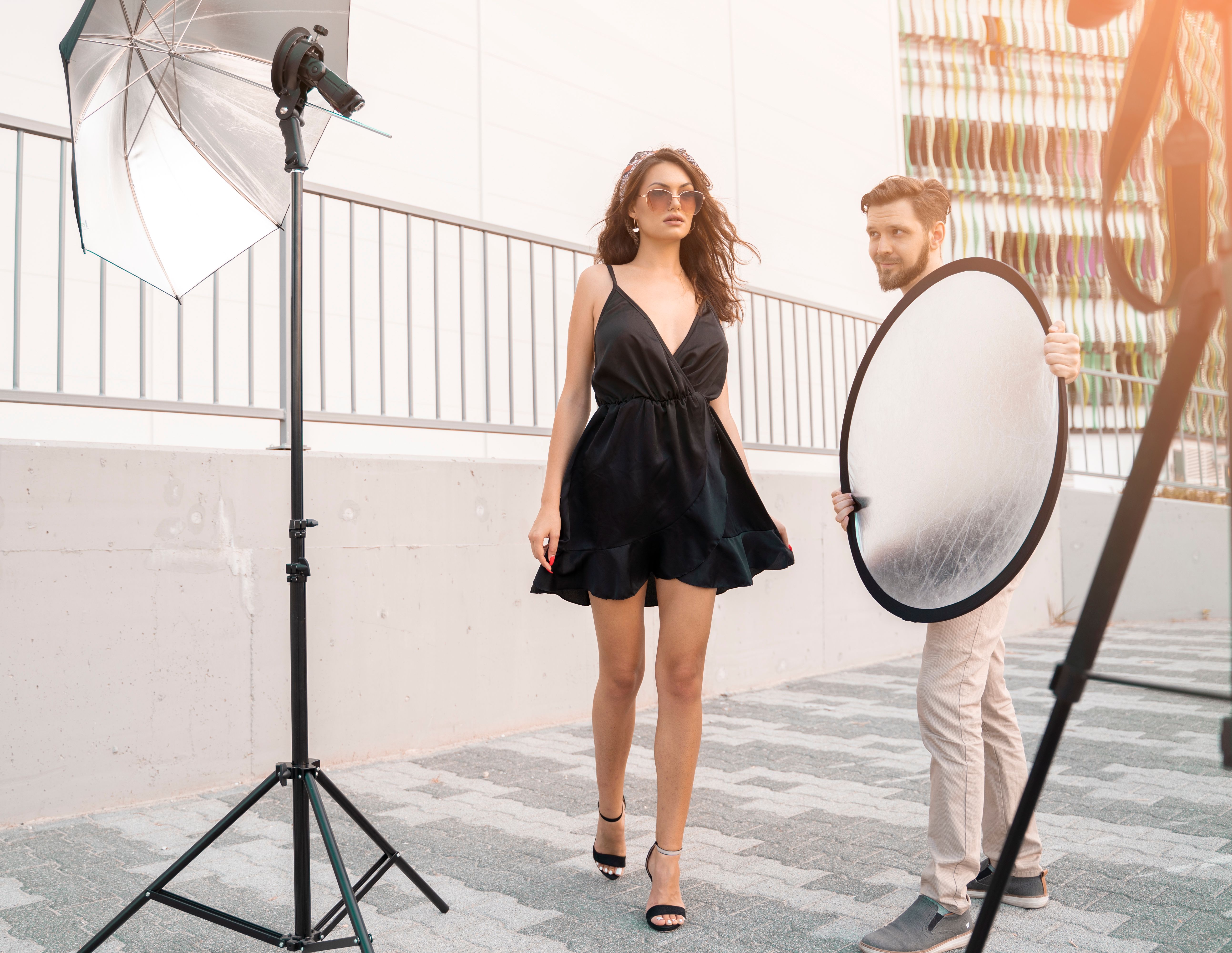 photographer with reflector