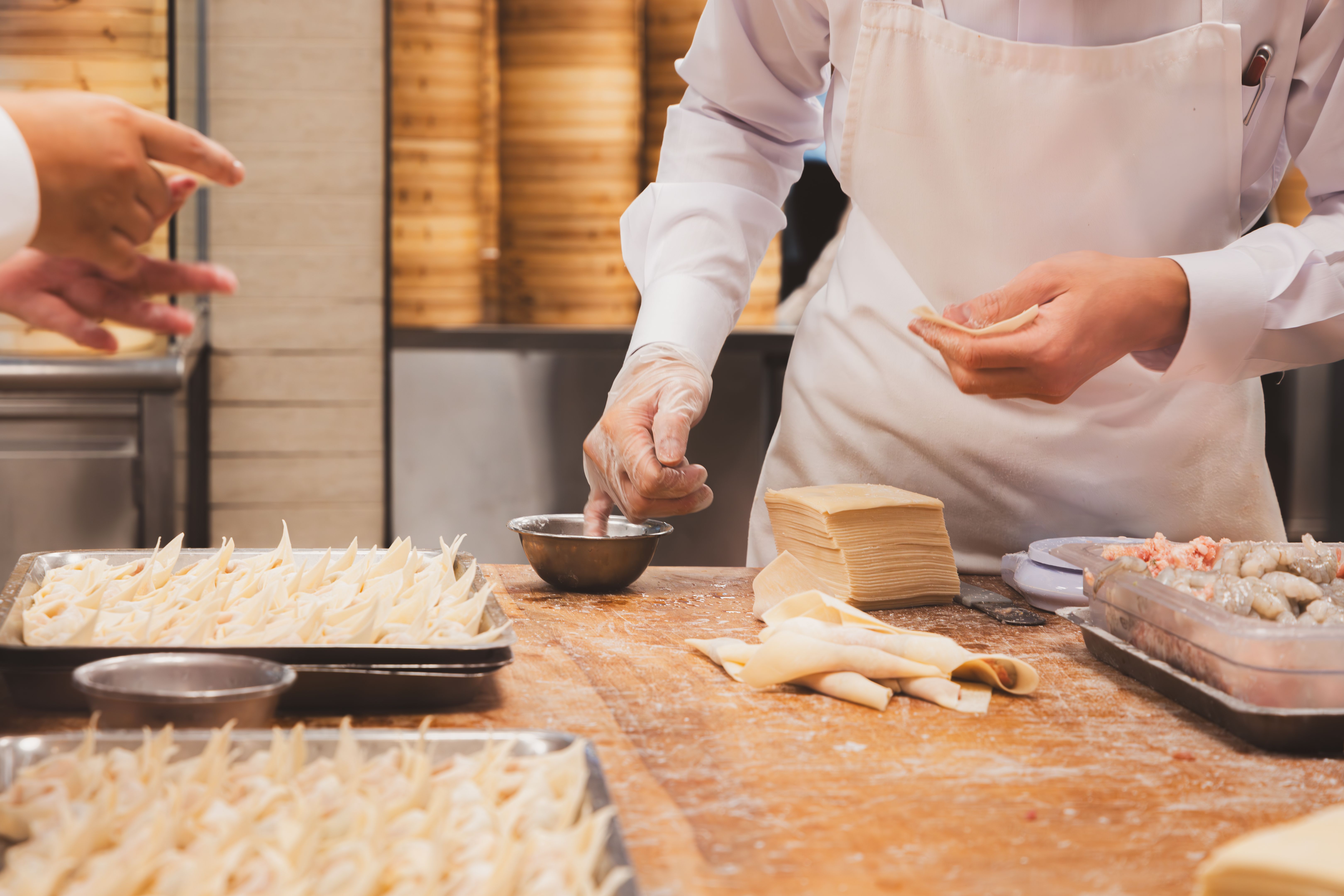 chef making dumplings