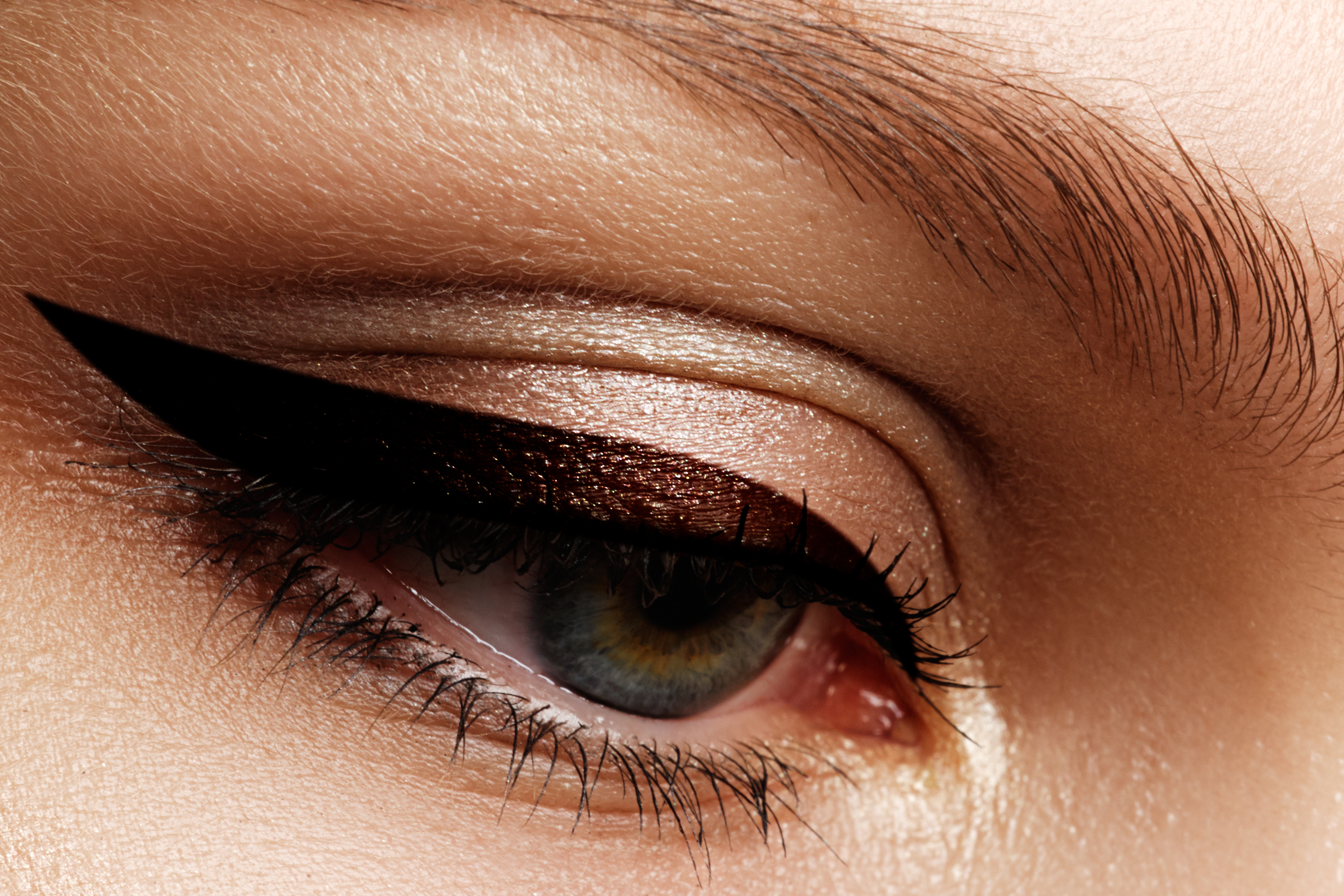 Elegance close-up of beautiful female eye with fashion eyeshadow