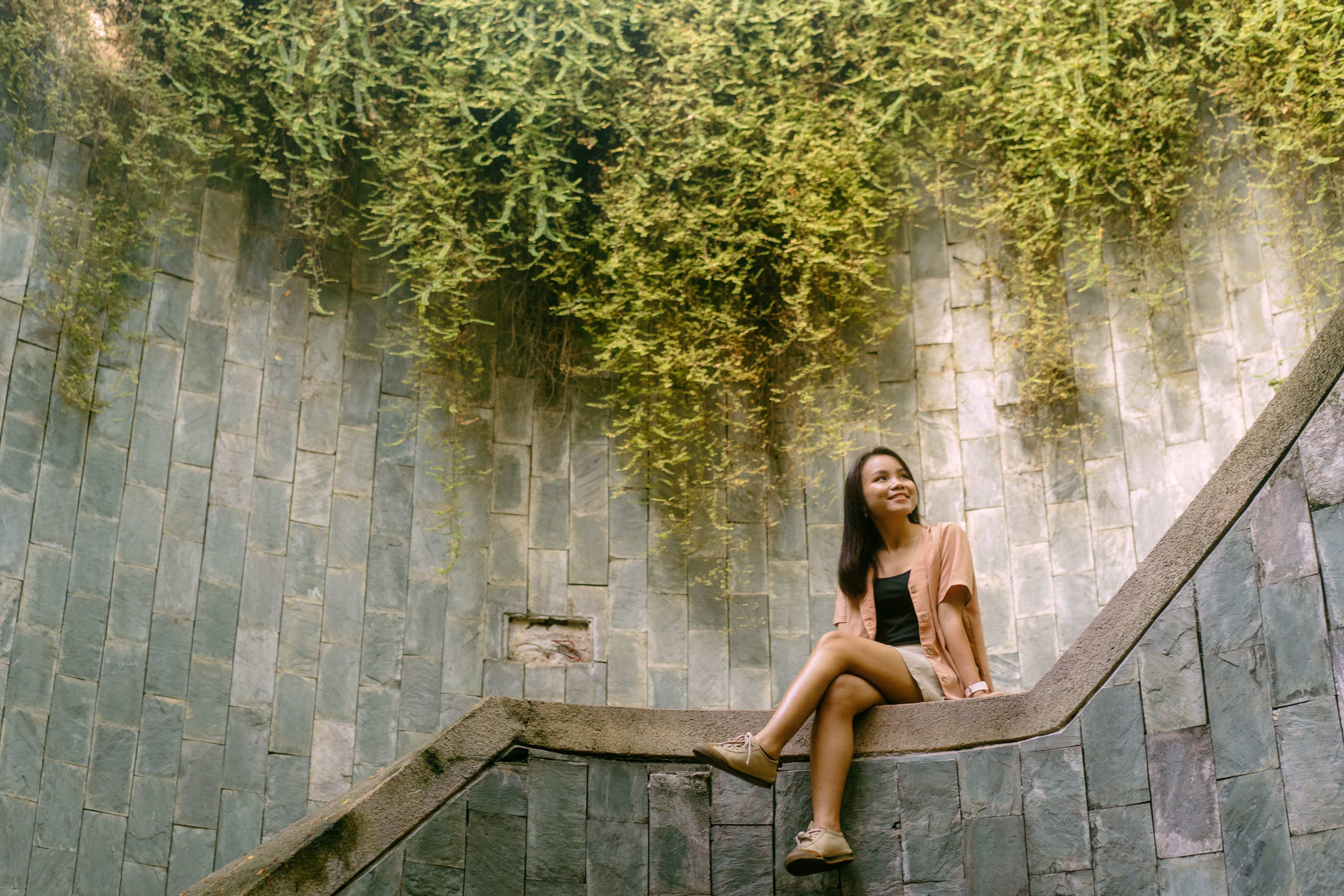 Asian Tourist Girl in a famous Fort Canning Park Staircase Photo Spot
