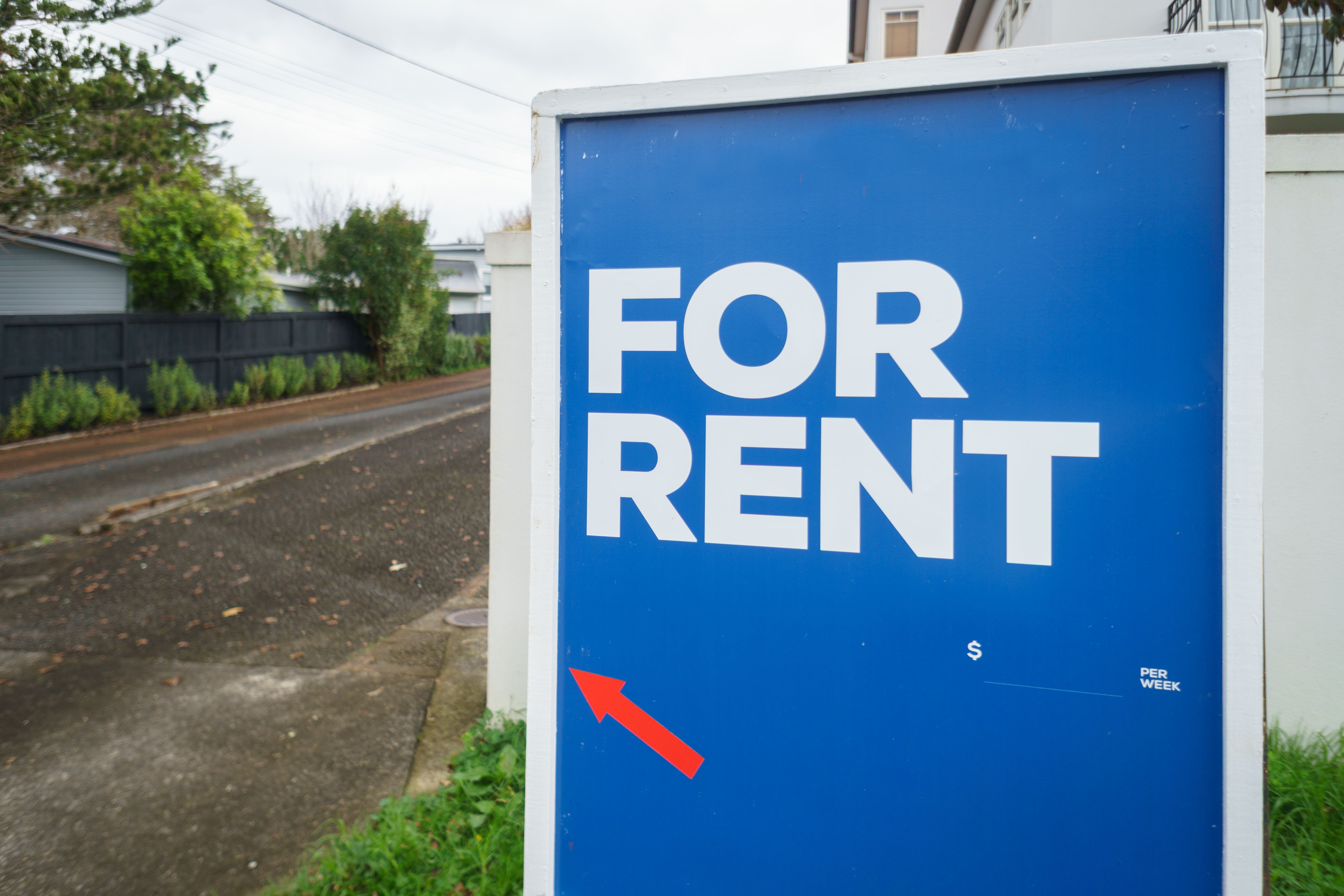 Business For Rent real estate sign. Arrow sign pointing the commercial property at the back of driveway. Business For Rent real estate sign. Arrow sign pointing the commercial property at the back of driveway.