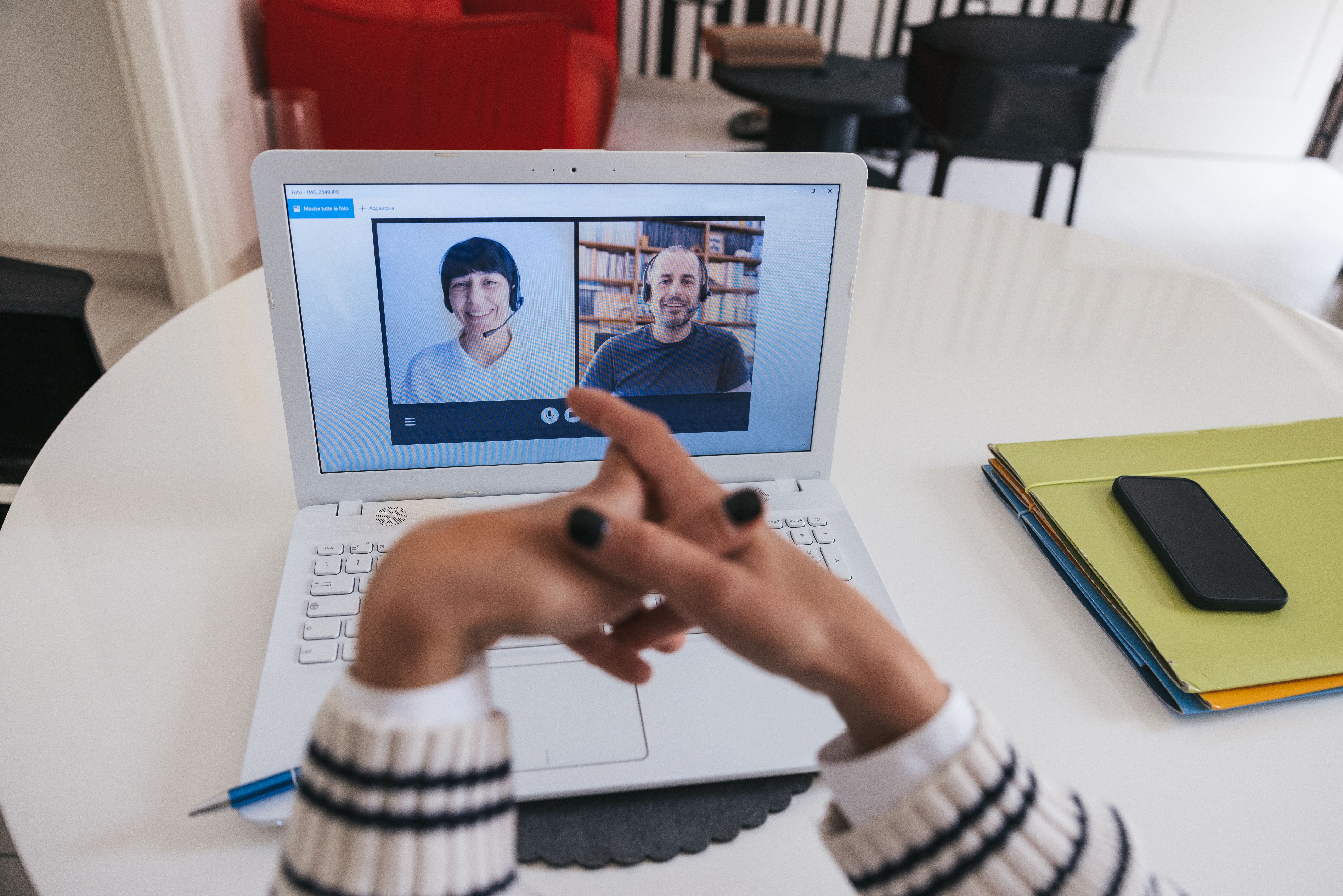 Woman working remotely for a contact center Woman working remotely for a contact center