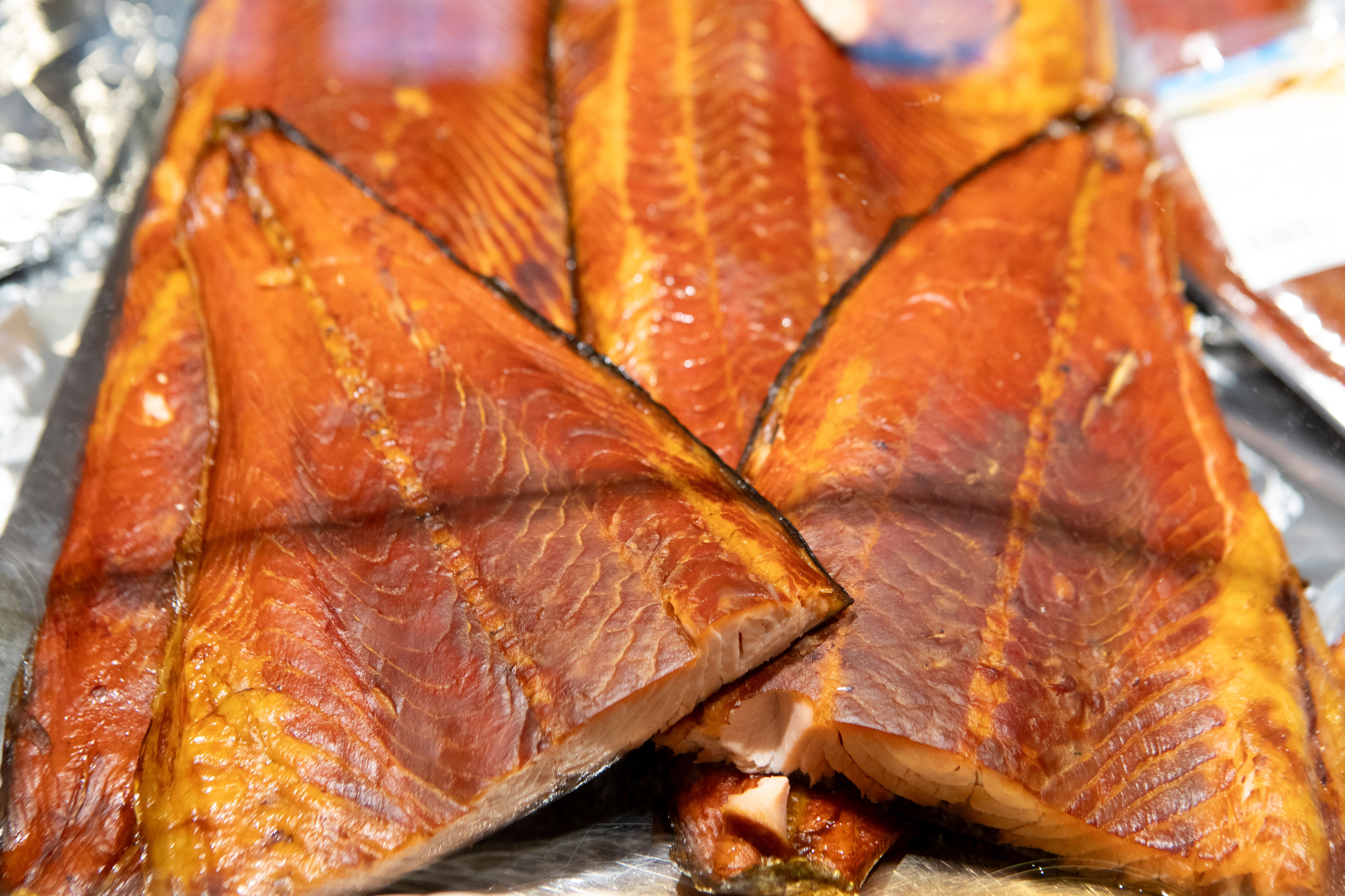Smoked salmon on a fish market stall