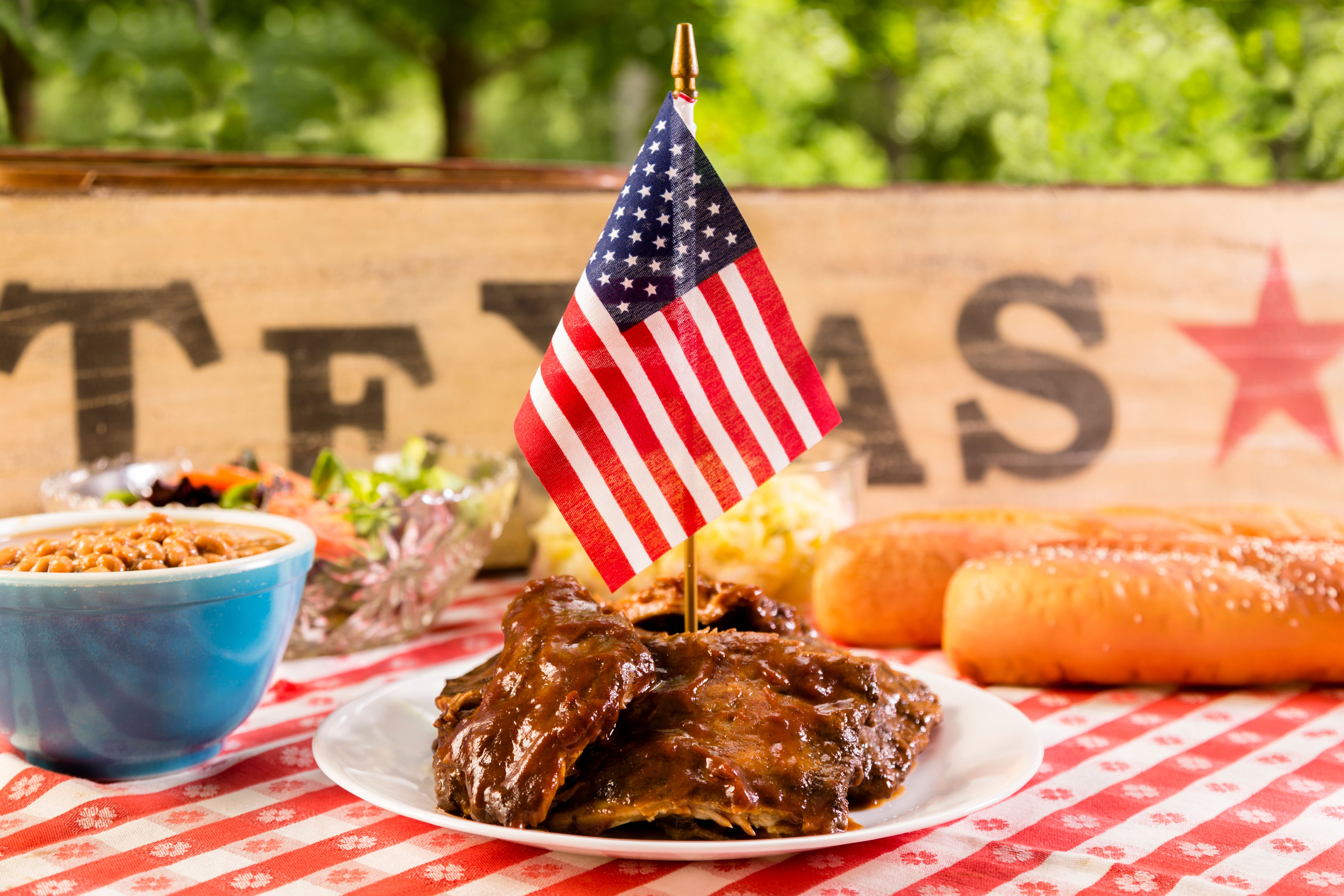 Food:  BBQ ribs, beans, potato salad and an American flag. Texas BBQ United States