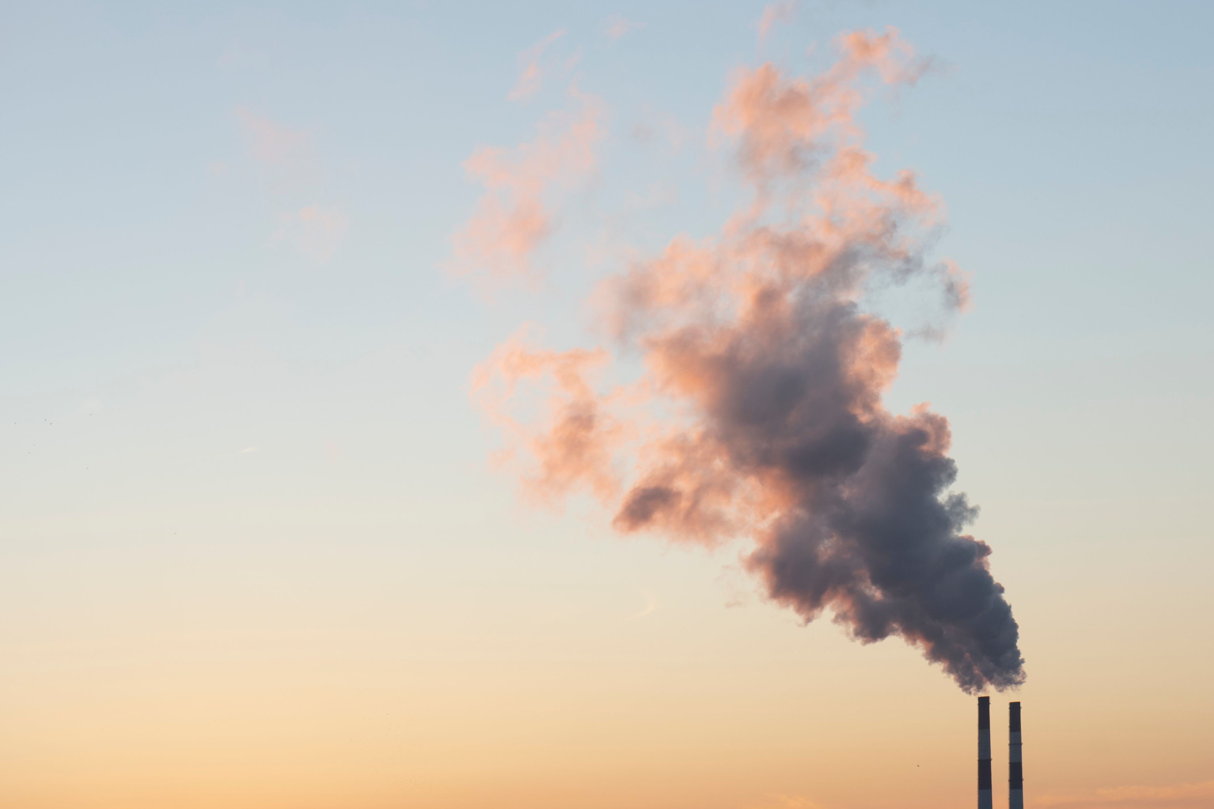 Harmful air pollution. Factory pipes pollute lots of toxic substances