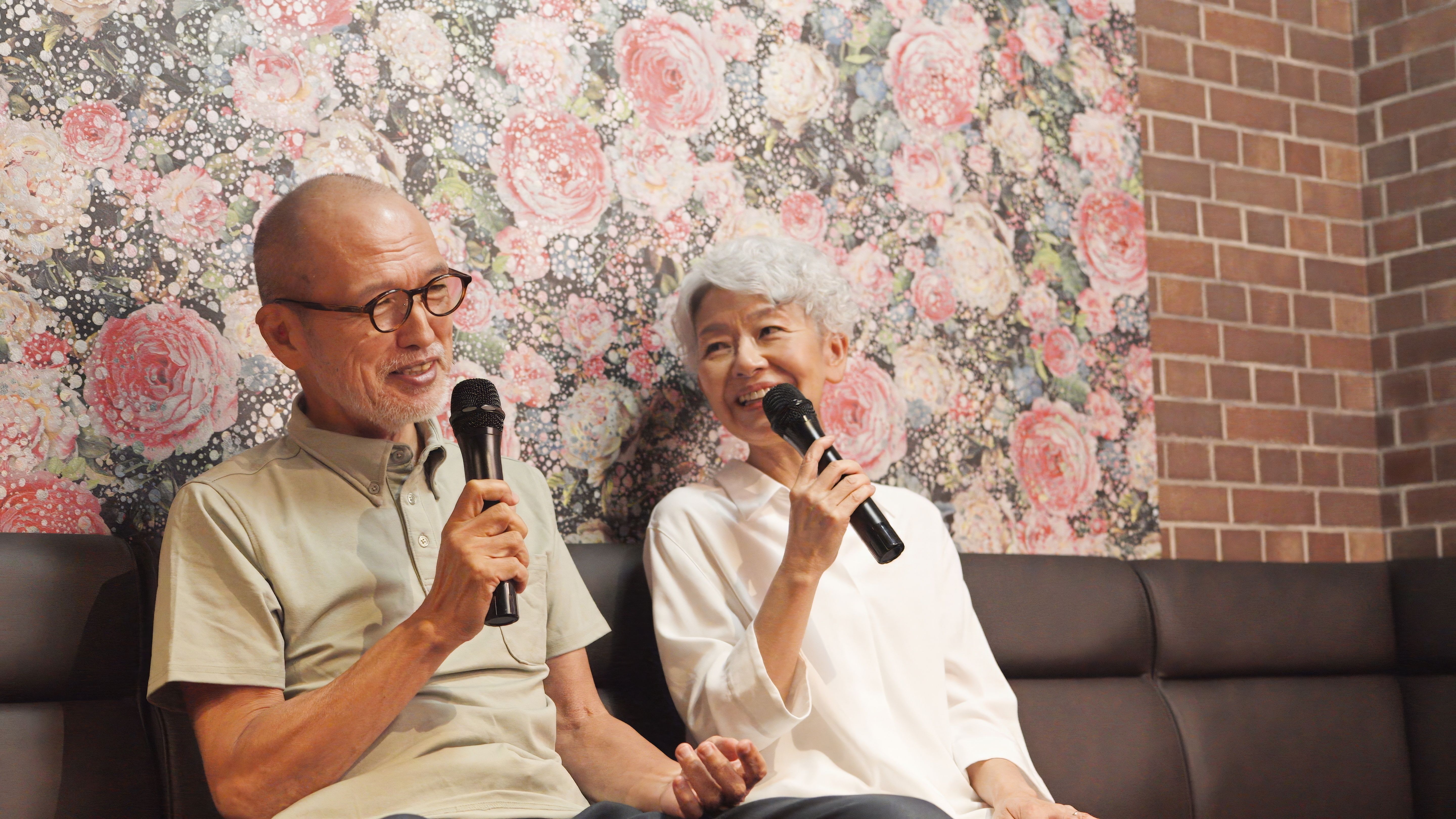 Asian elderly people enjoying karaoke at a care facility