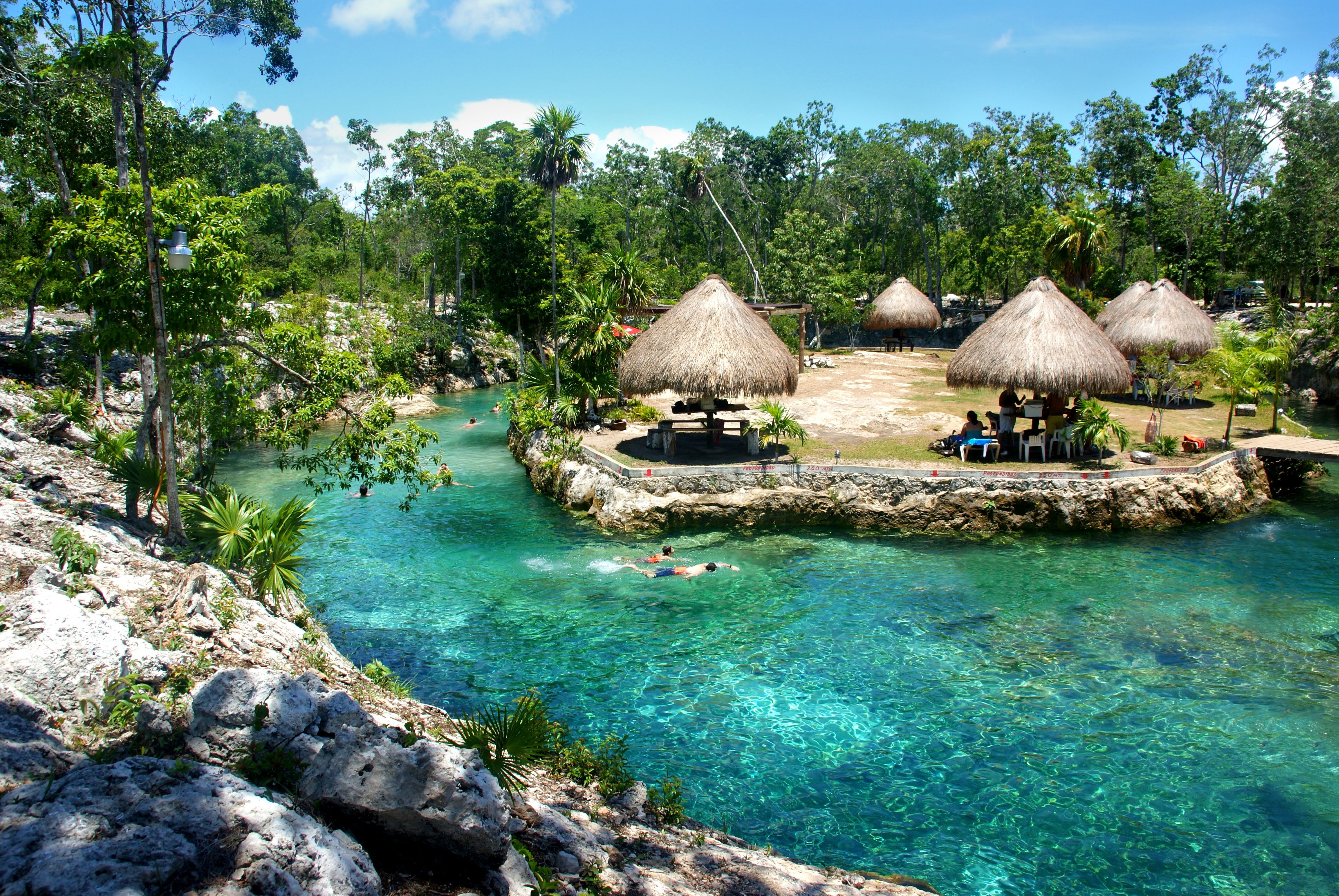 turquoise cristal water pool (cenote) near Tulum