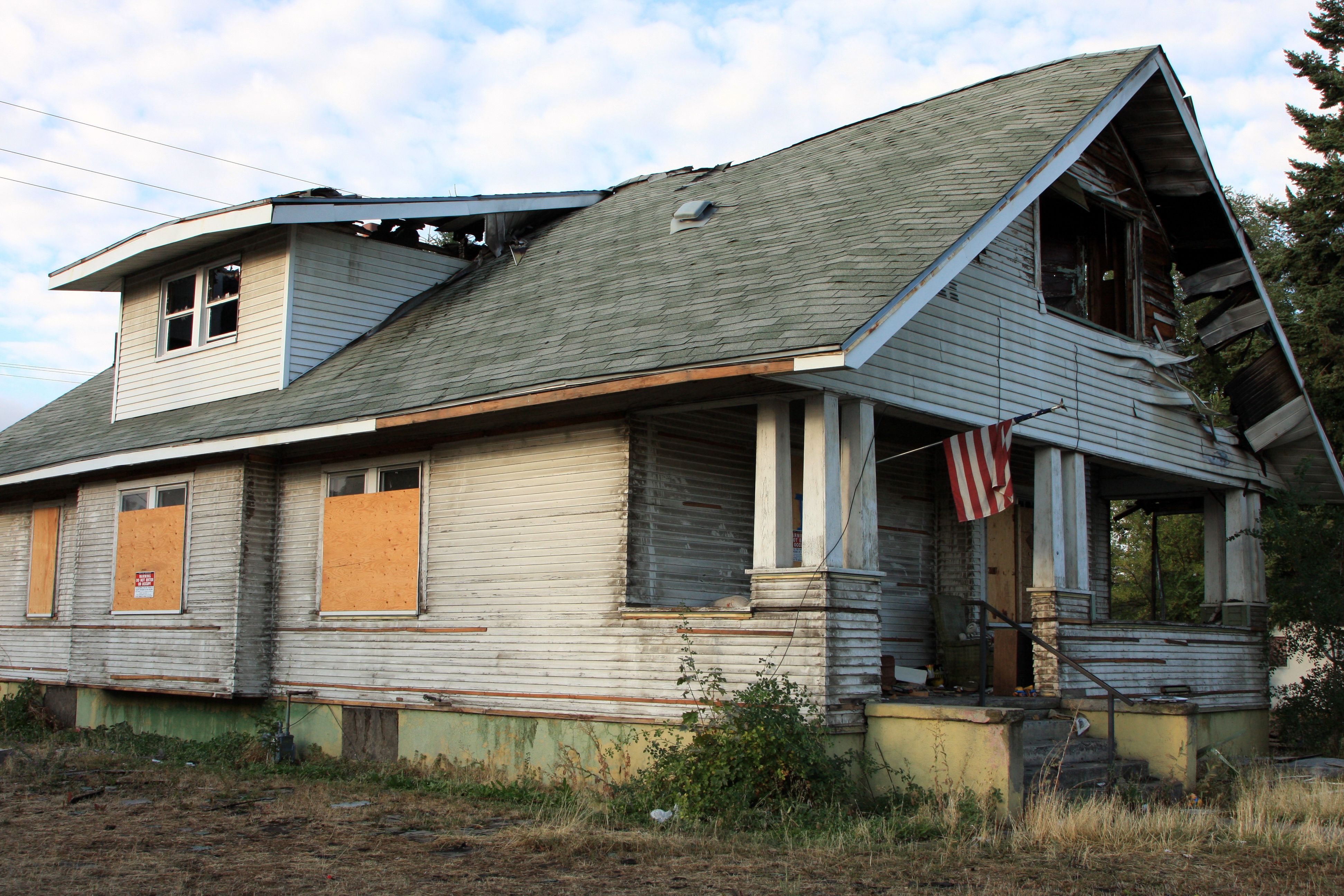 boarded up house