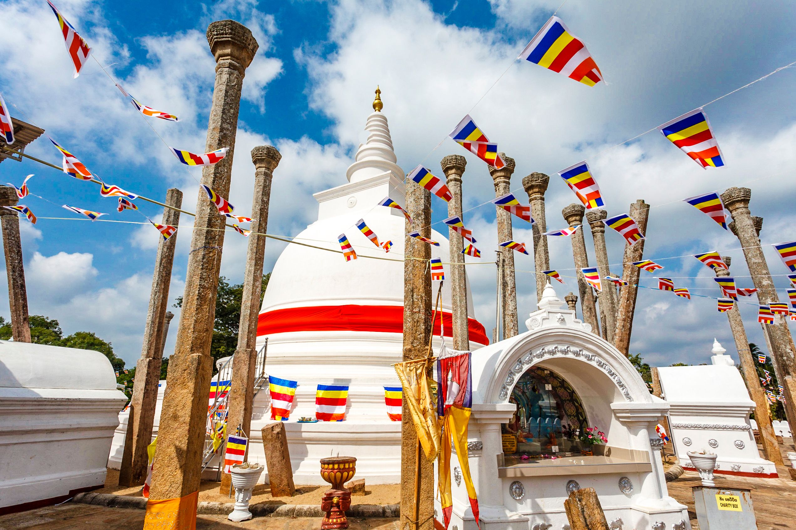 The white Thuparama dagoba with a red ribbon, Anuradhapura, Sri Lanka, Asia