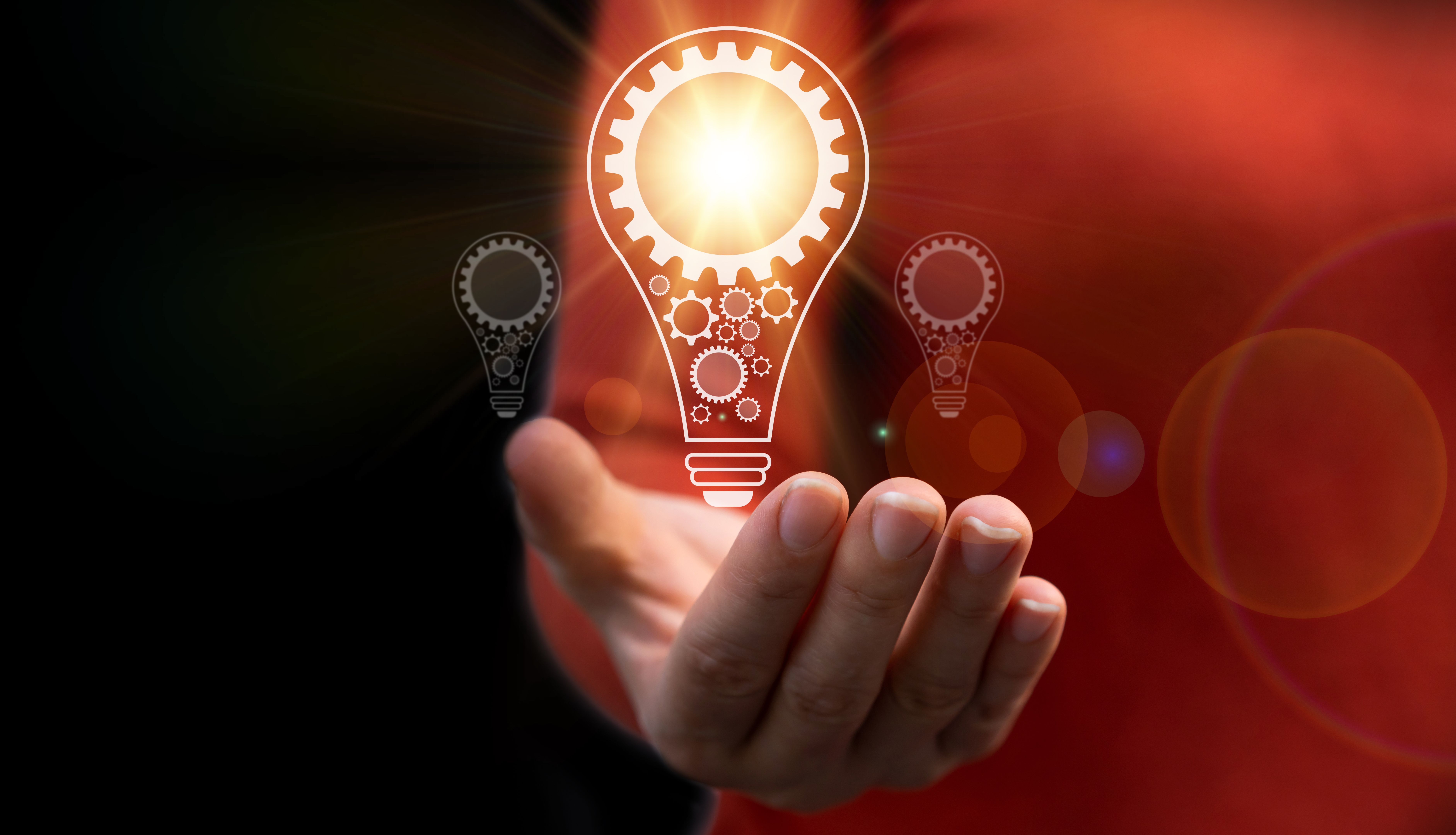 Human hand with a light bulb and gear icon.idea of ââinspiration from online technology, smart thinking brainstorming creative idea, education knowledge study and learn, innovation idea concept
