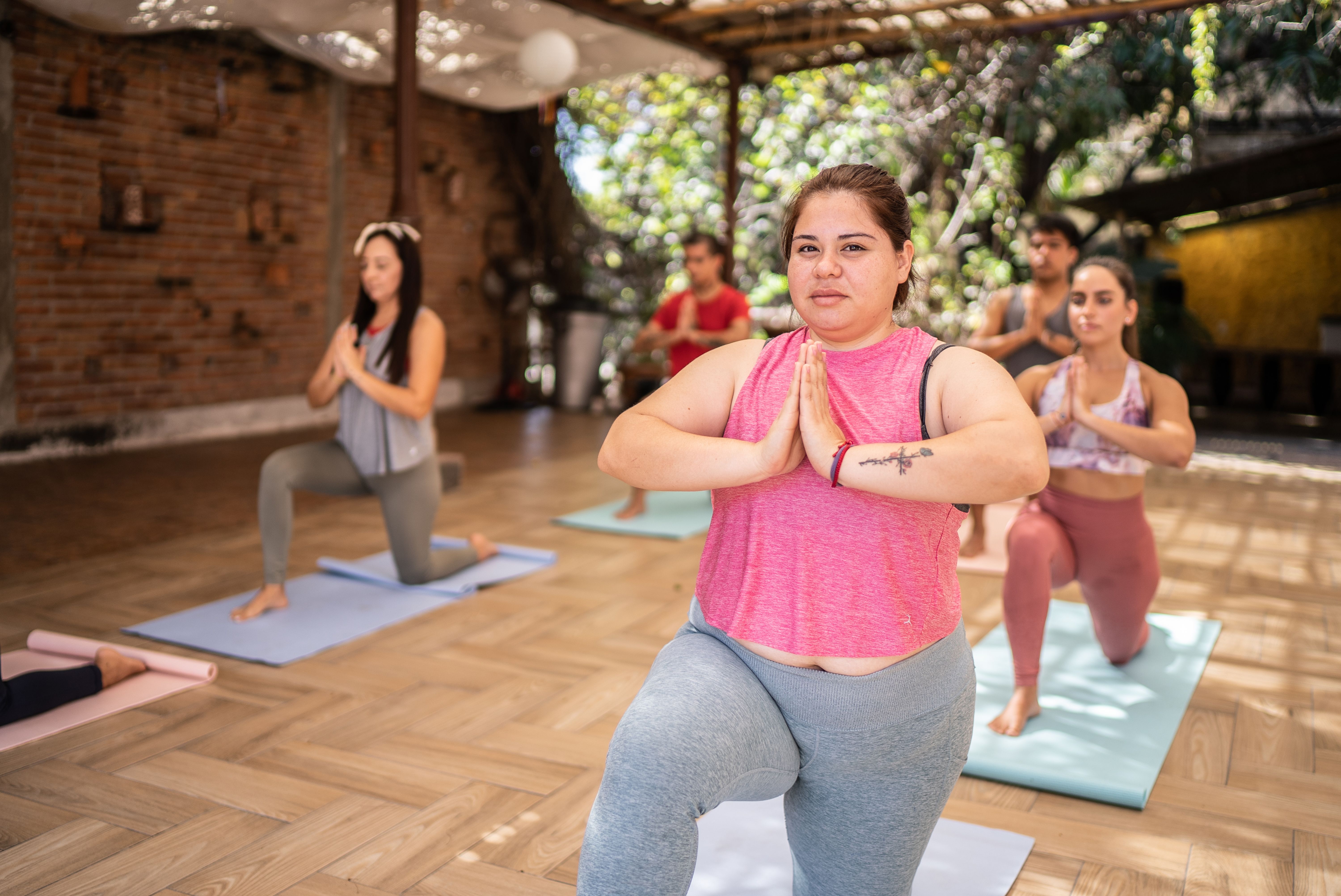 Portrait of a young woman in a yoga class