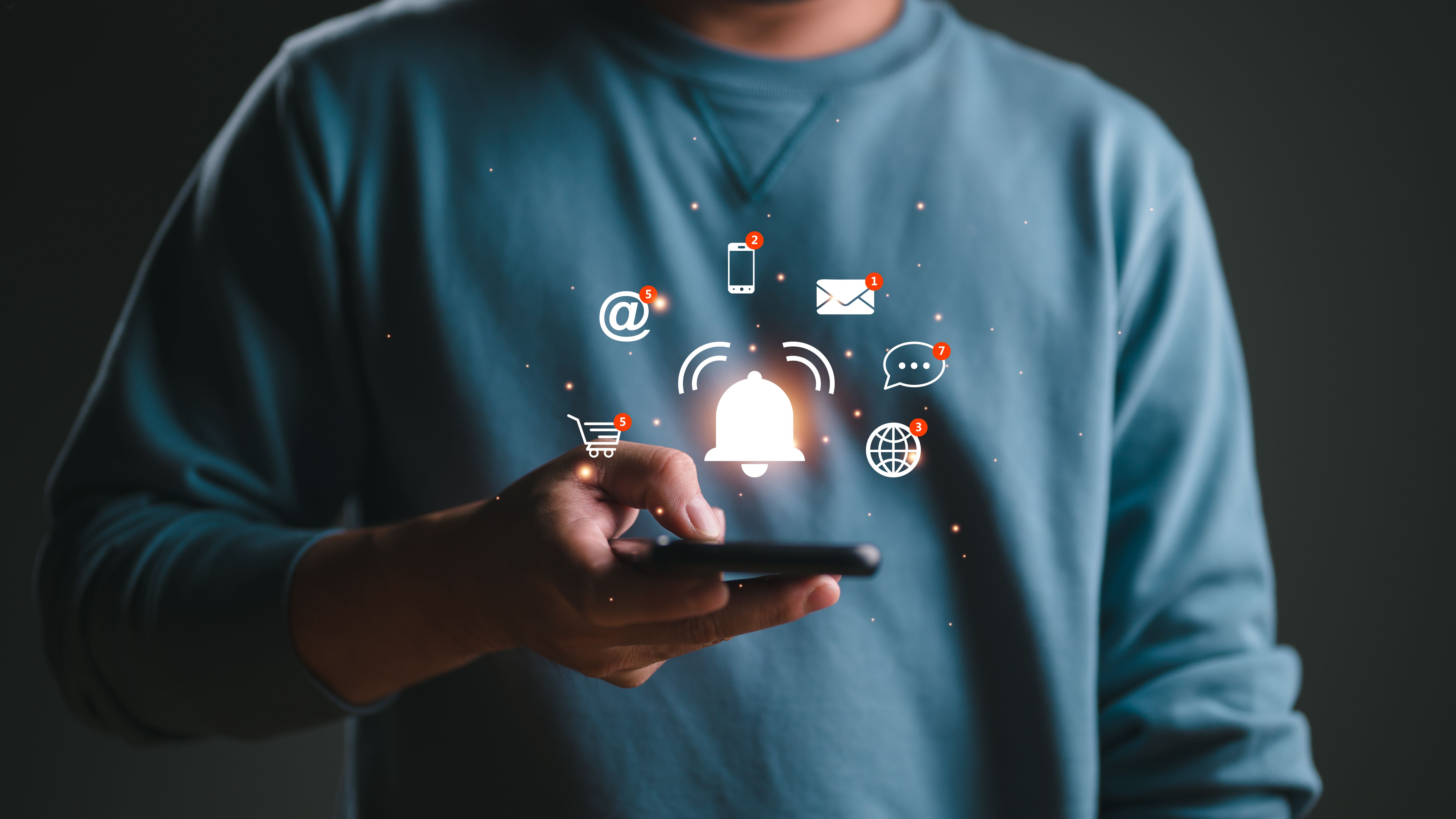Business people using smartphone with virtual bell ringing for application notification alert concept, New email, digital marketing, electronic message alert.