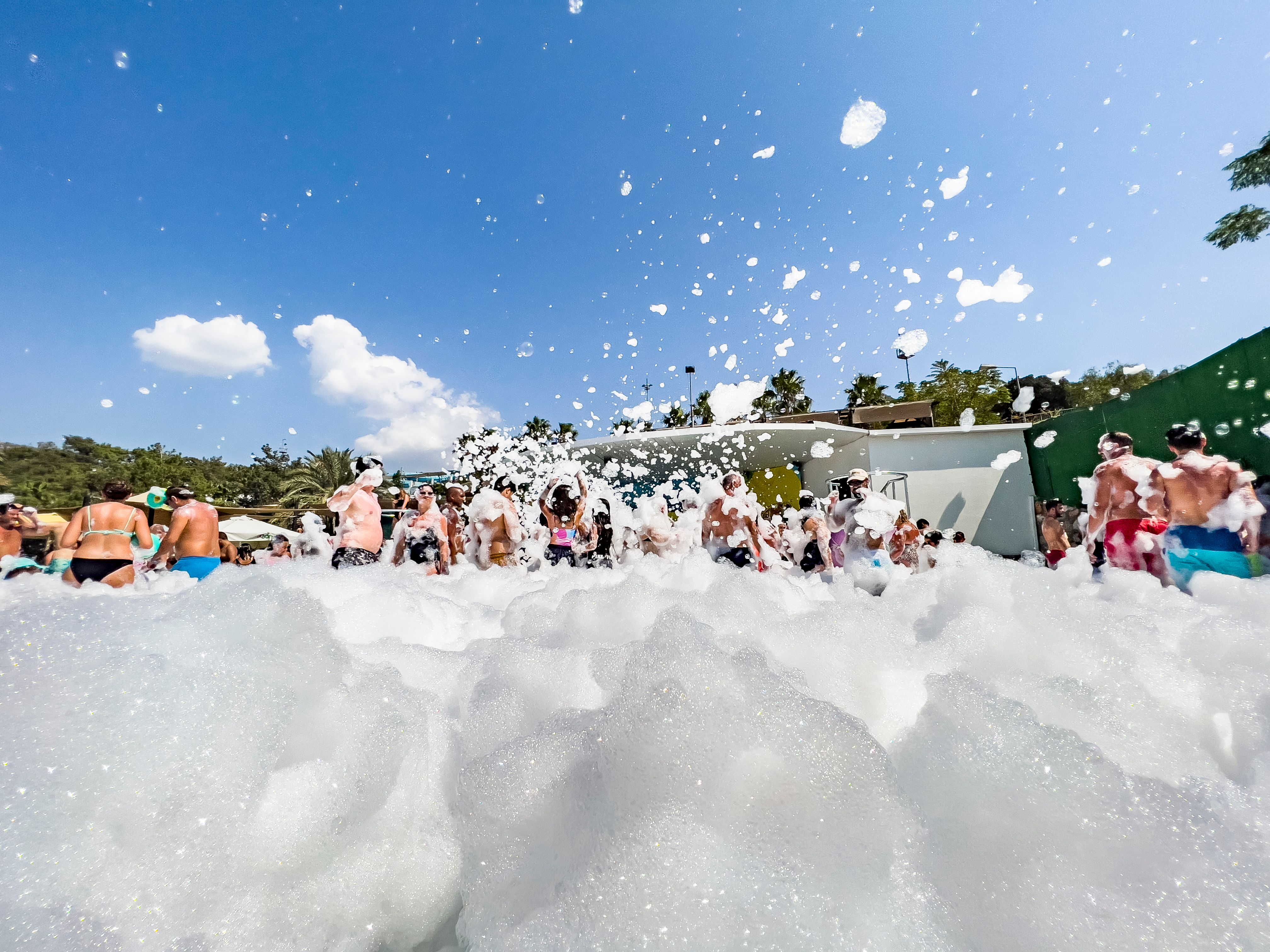 People enjoying outdoor foam party