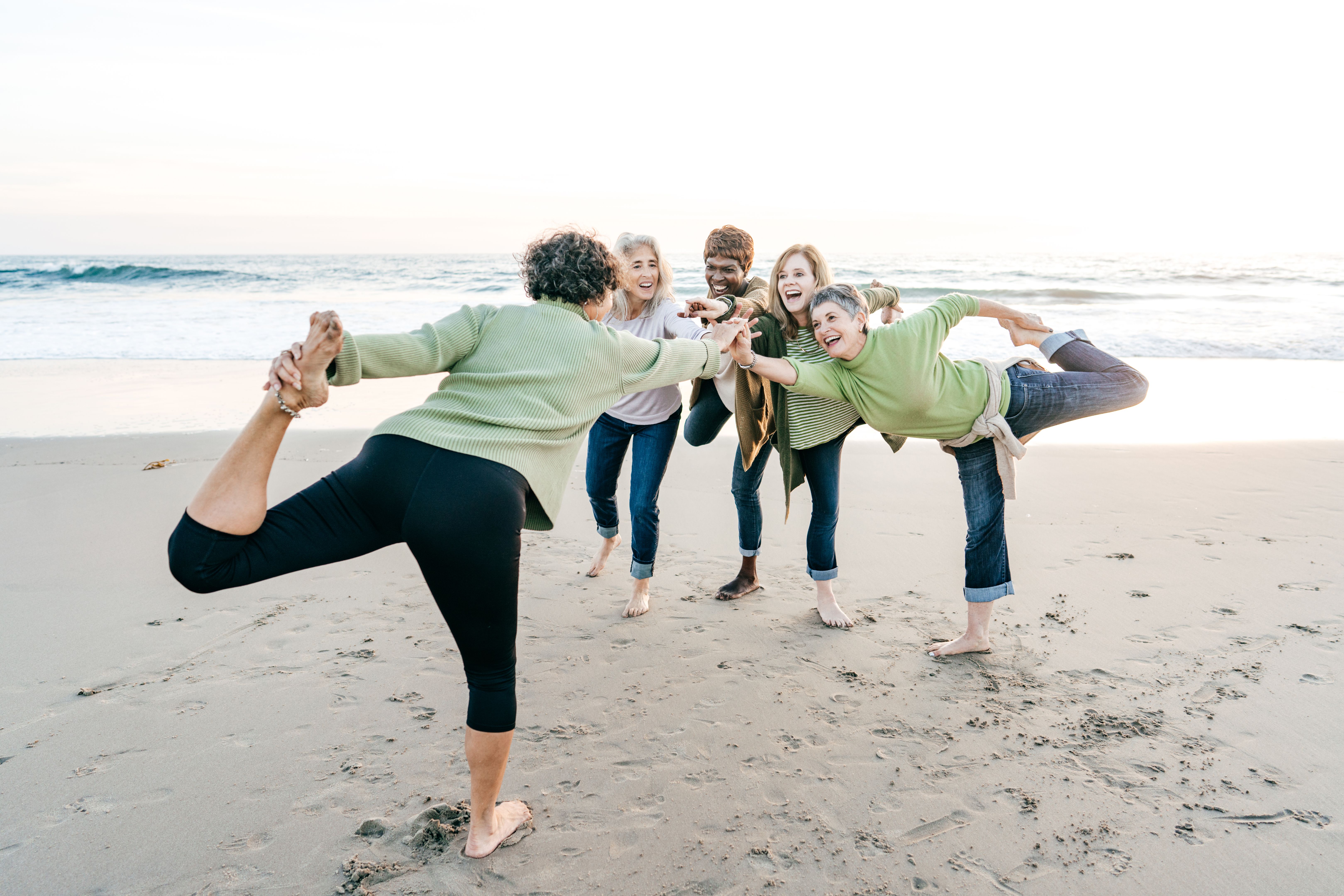 group yoga sea