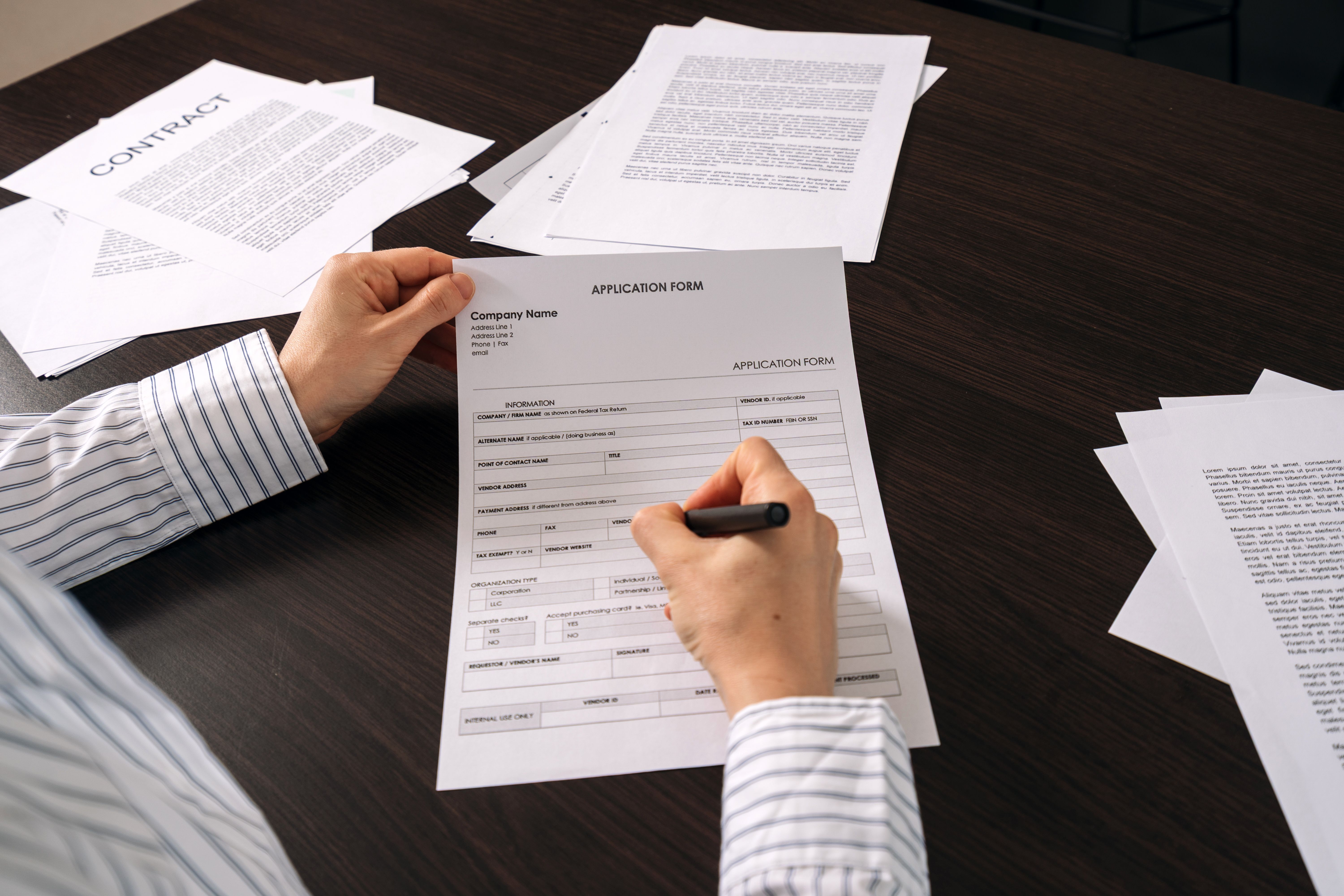 person filling application